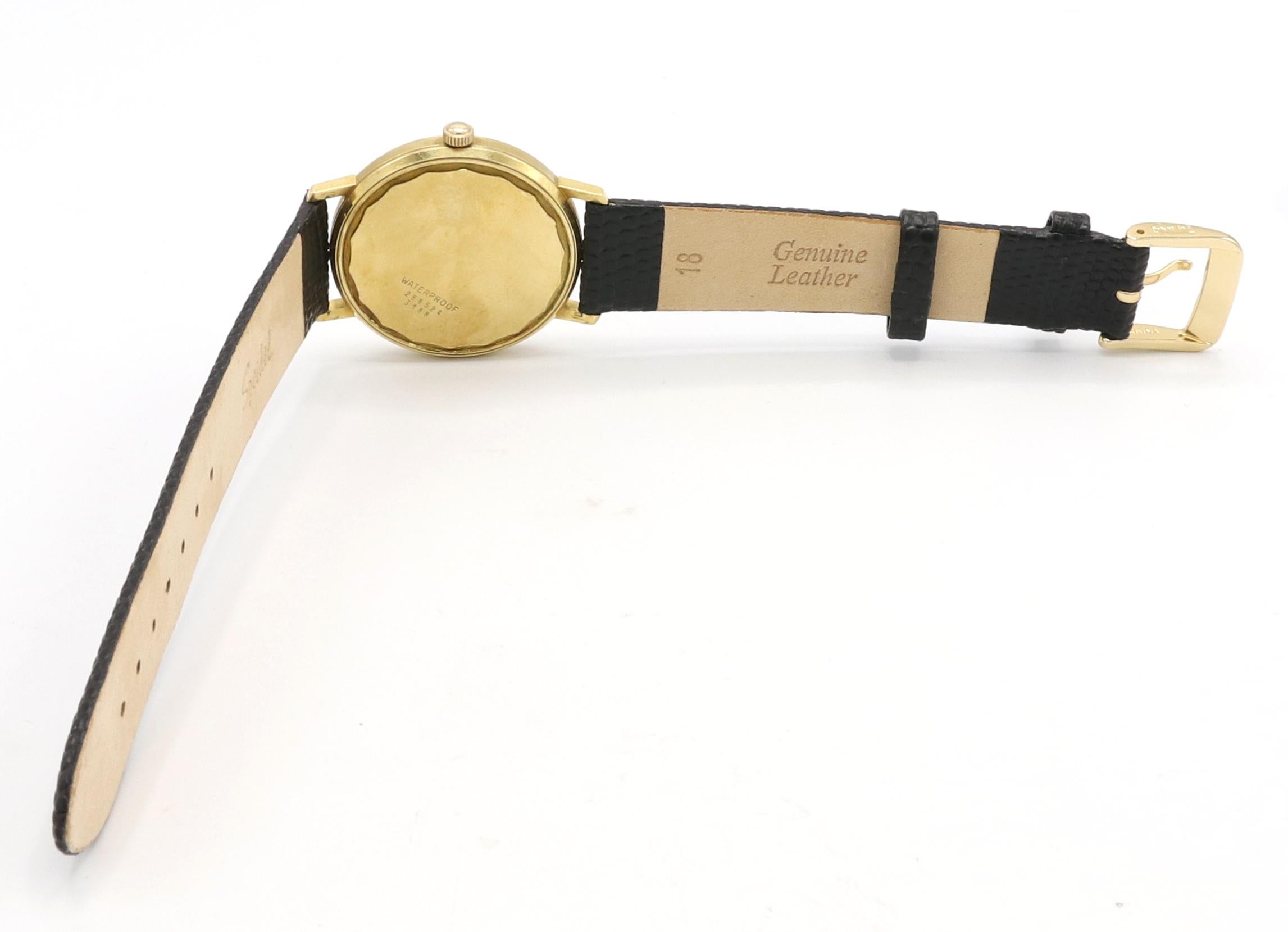 Vintage Baume & Mercier Baumatic  18 Karat Yellow Gold Leather Strap Wrist Watch In Good Condition In  Baltimore, MD