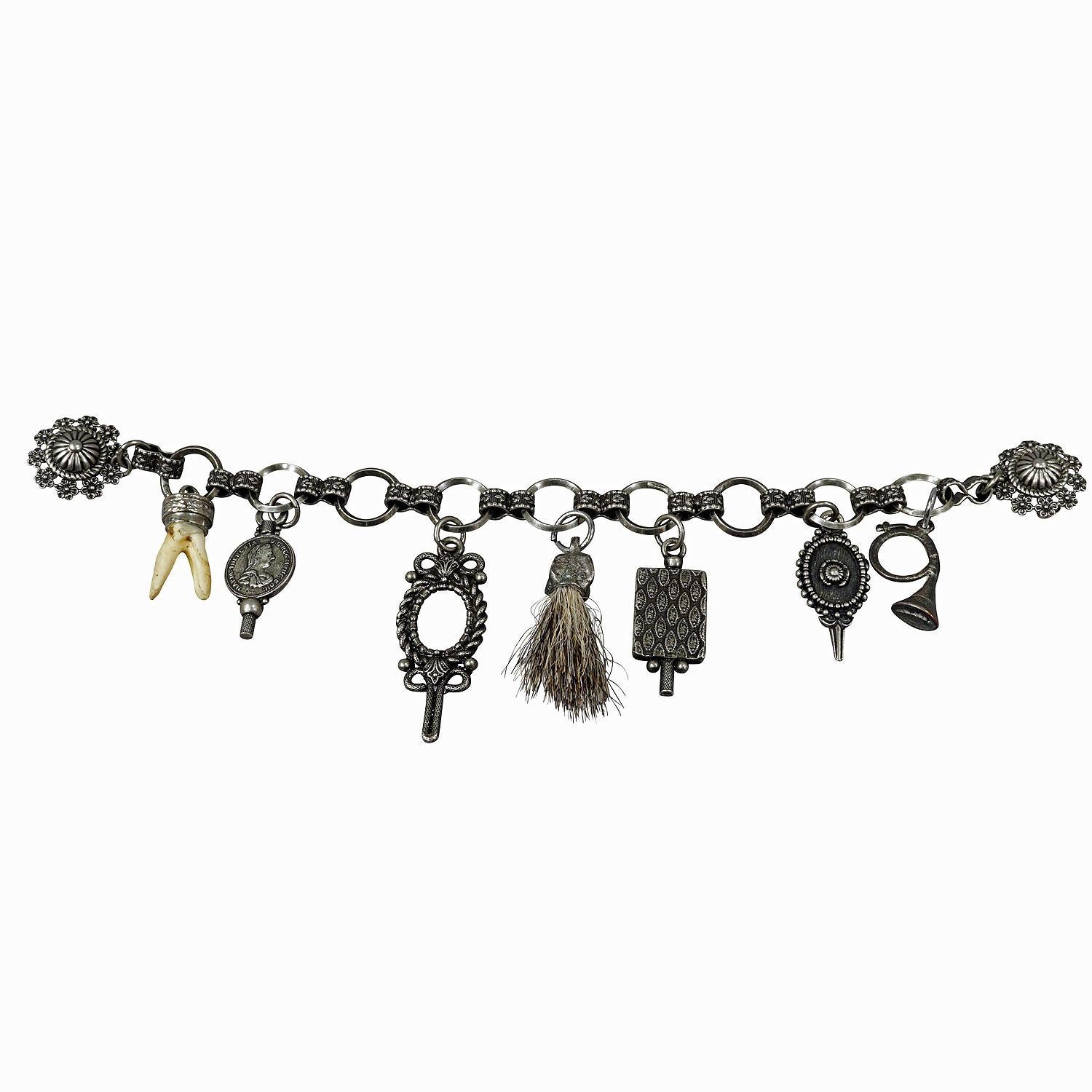 Vintage Bavarian Traditional Costume Jewelry Charivari with Hunting Pendants
Item e7409
A Bavarian Charivari from the middle of the 20th century. A beautiful piece of historical Bavarian folk art jewelry, a real collector's item. A charivari is a
