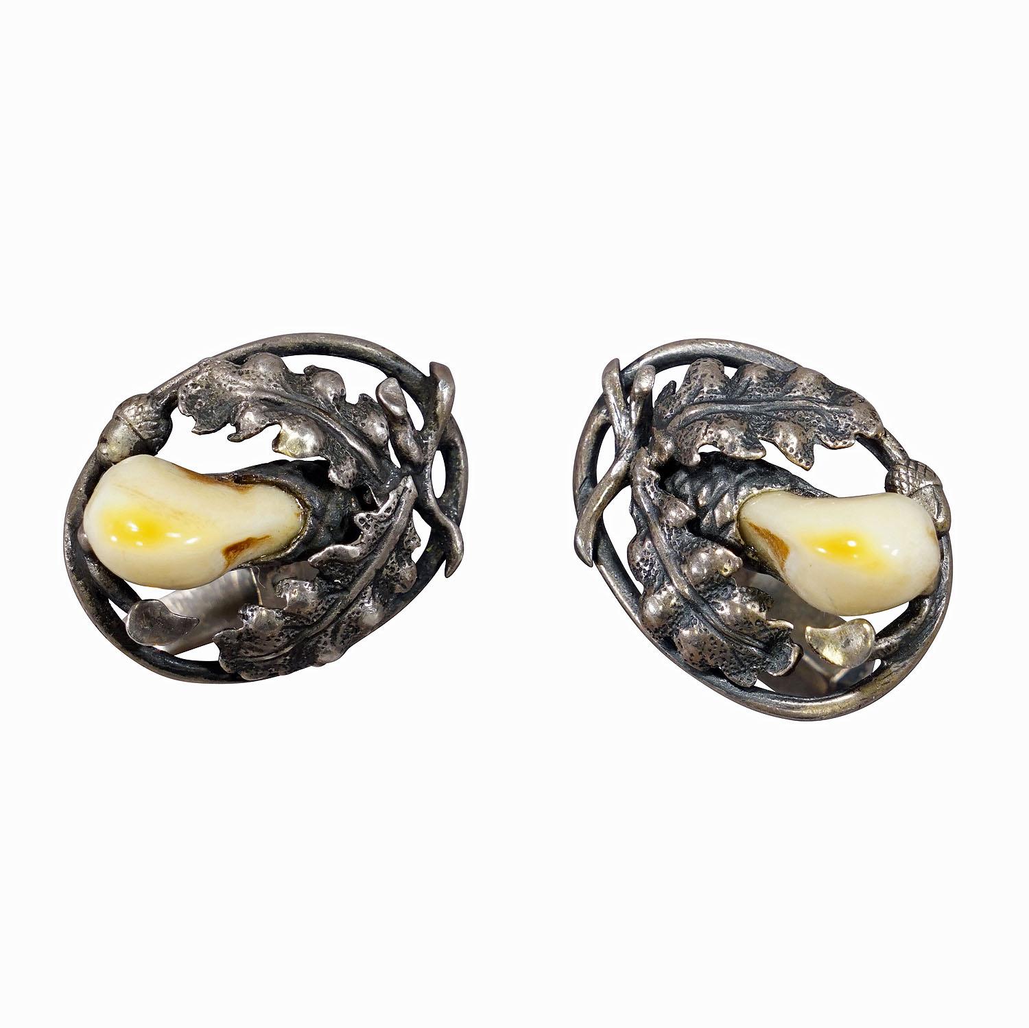 Vintage Bavarian Traditional Costume Jewelry Cufflinks

A pair Bavarian cufflinks from the middle of the 20th century. A beautiful piece of historical Bavarian folk art jewelry, a real collector's item. Together with a charivari and a hat with