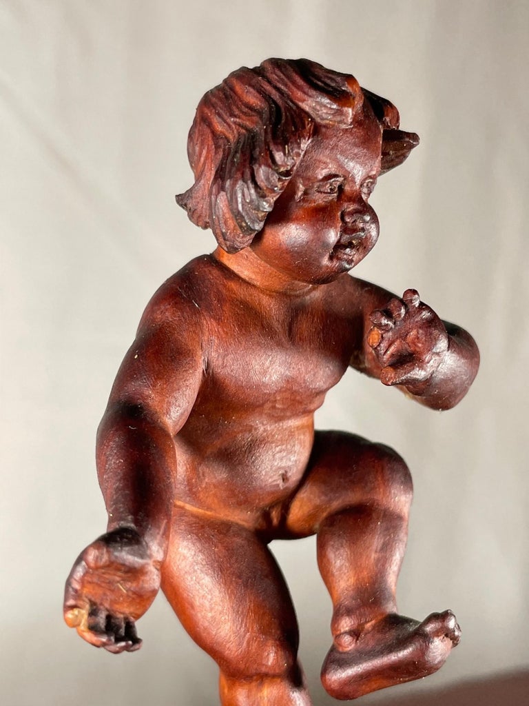Vintage Bavarian Wood Carving of the Infant Bacchus For Sale at 1stDibs