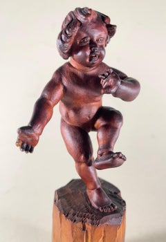Vintage Bavarian Wood Carving of the Infant Bacchus