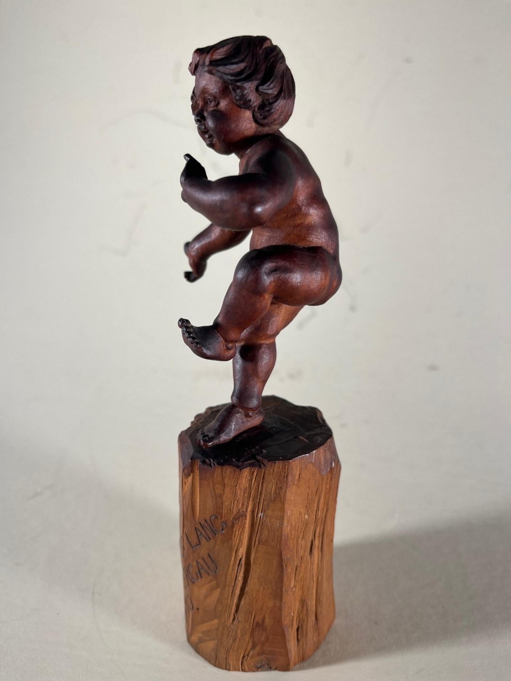 Vintage Bavarian Wood Carving of the Infant Bacchus In Good Condition For Sale In Vero Beach, FL