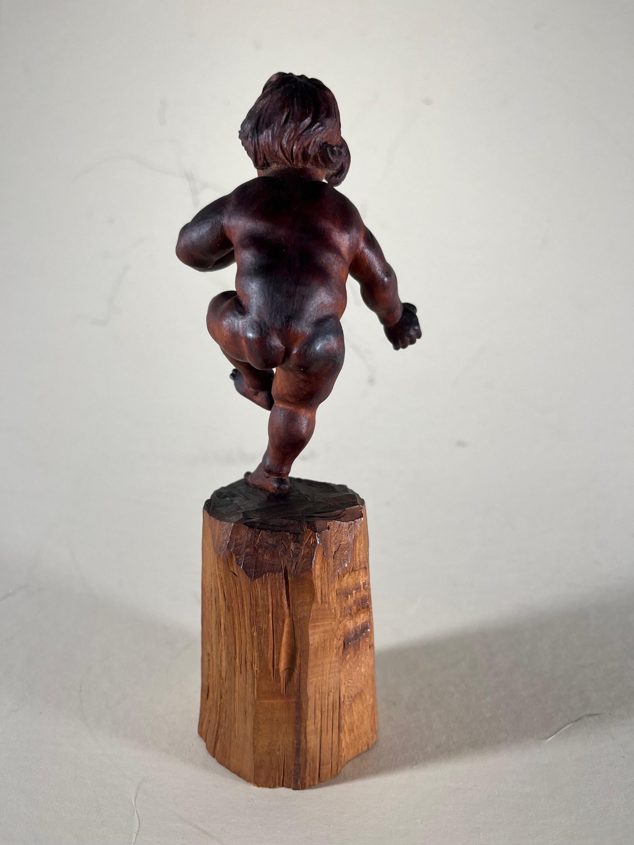 Early 20th Century Vintage Bavarian Wood Carving of the Infant Bacchus For Sale