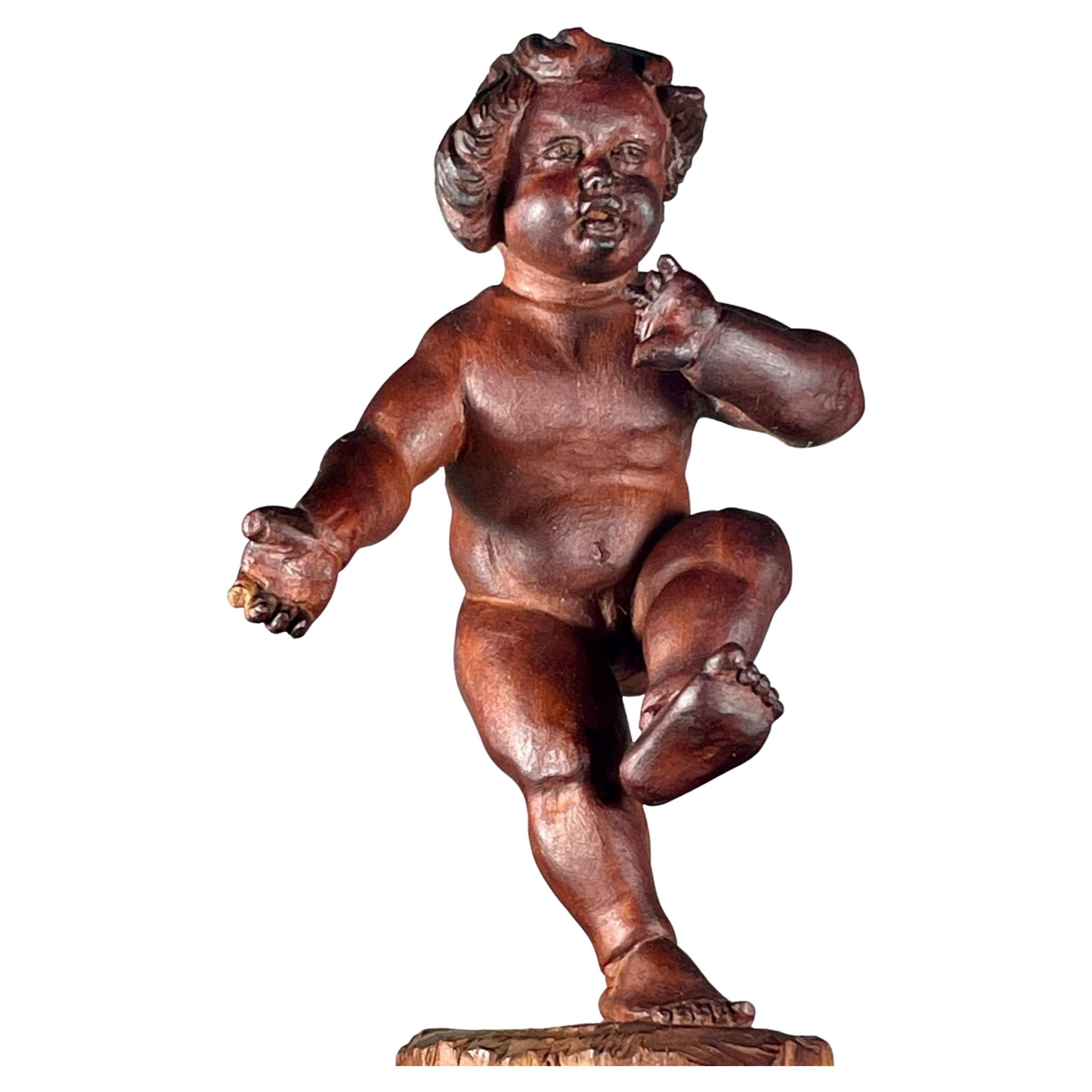Sculpture vintage bavaroise représentant l'infant Bacchus