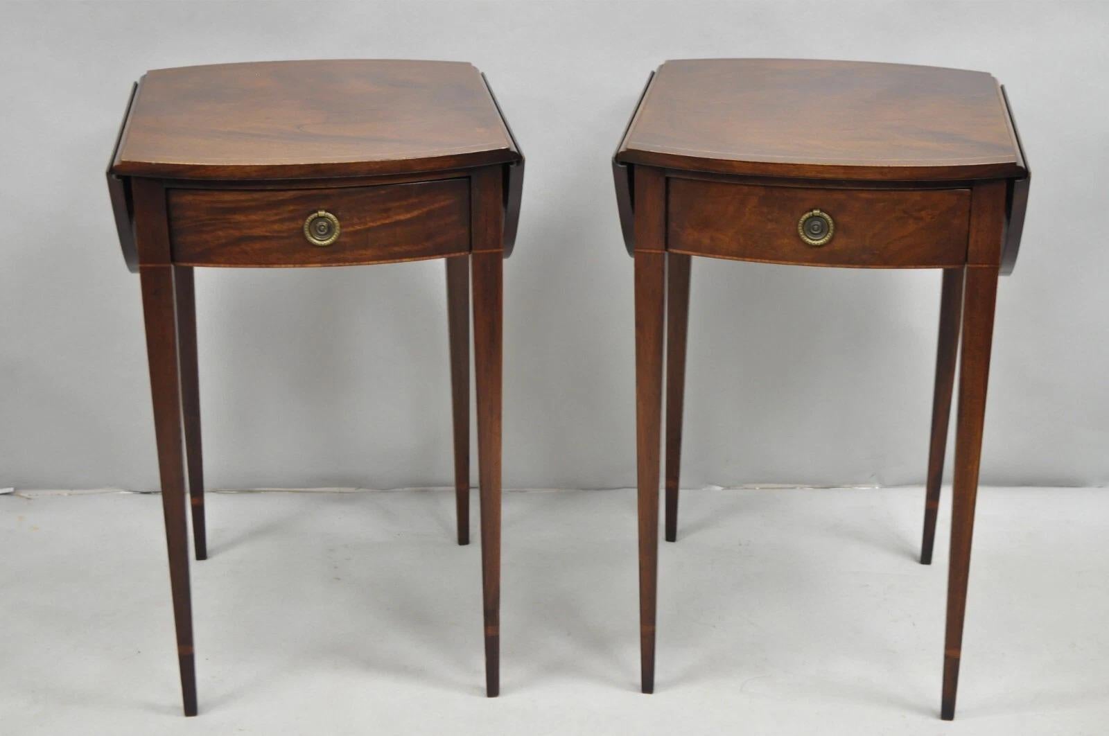 Vintage Beacon Hill Federal Style Small Mahogany Dropleaf Pembroke End Tables with Pencil Inlay and Single Dovetailed Drawer - a Pair. Circa Early 20th Century. Measurements: 27