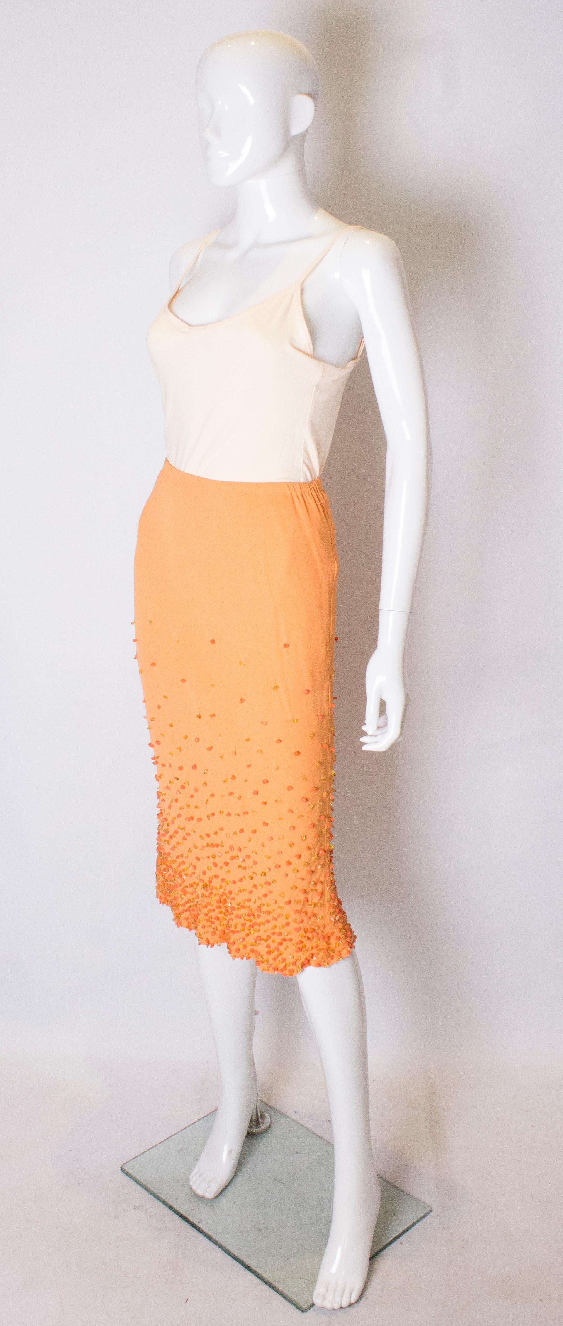 orange beaded skirt