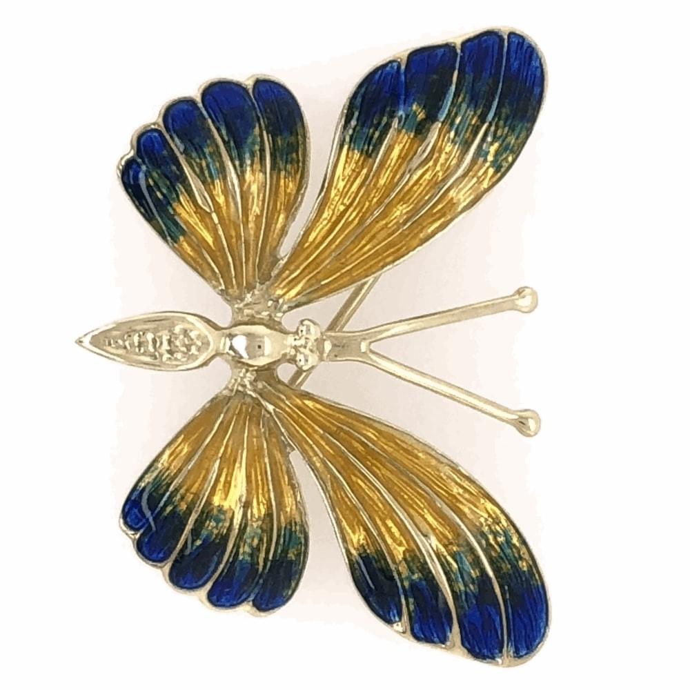 Chic and Timeless Butterfly pin with blue, green and gold enamel wings. Hand crafted in 14 Karat Gold. Approx. size: 1.38