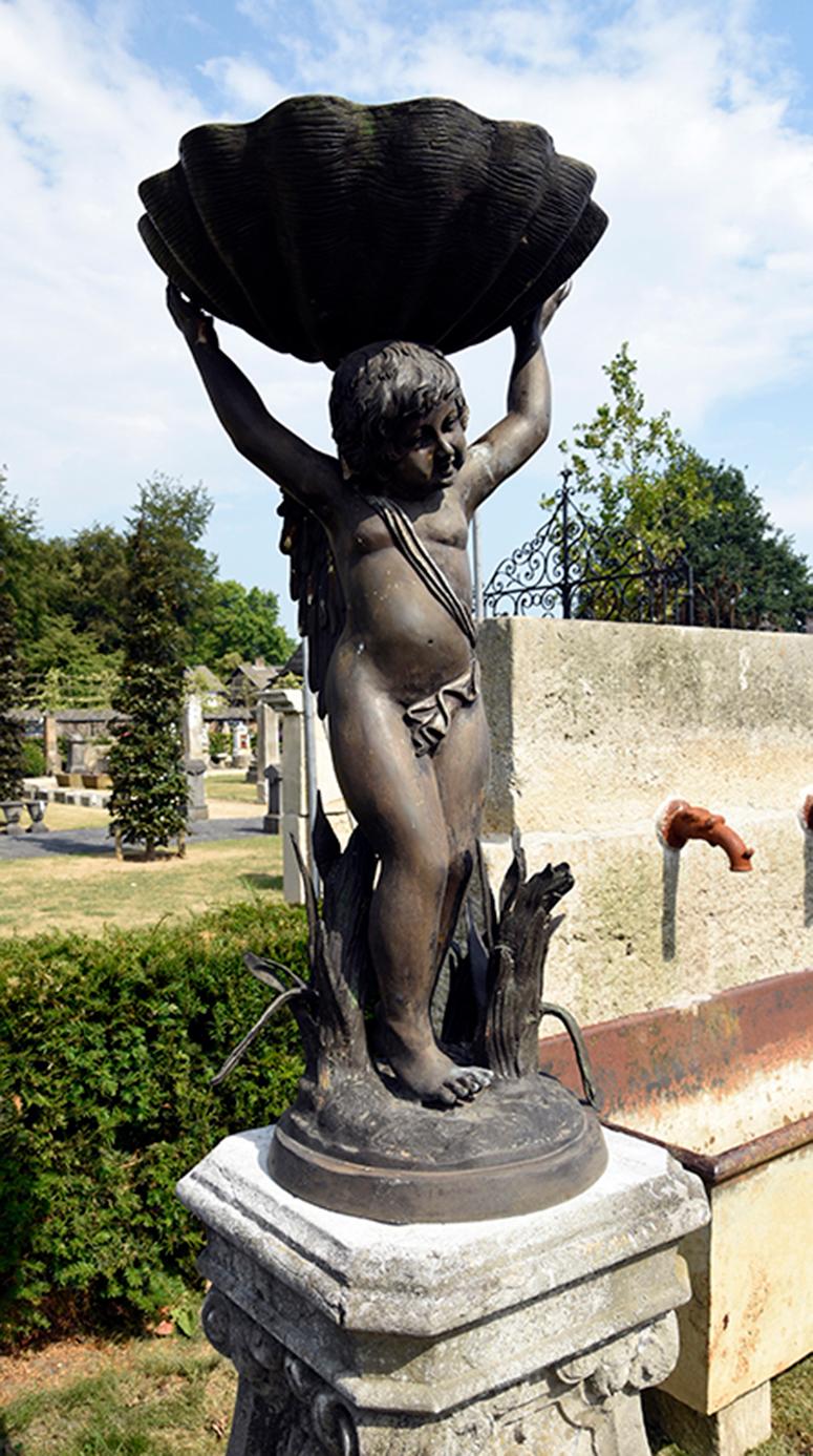 Statue that can be used as a fountain. Great to place in your garden.