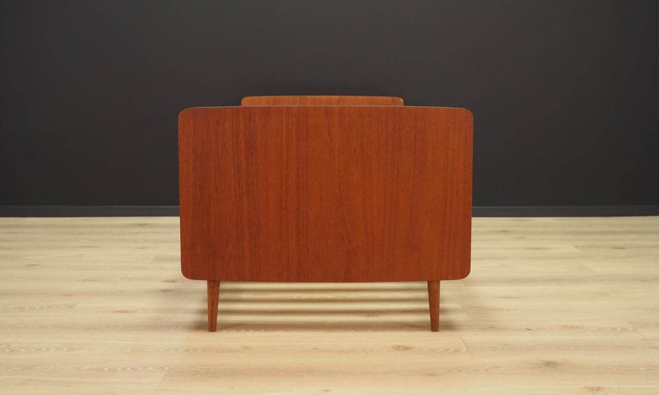 Fantastic bed frame from the 1960s-1970s. Scandinavian design, Minimalist form. Surface finished with teak veneer. Maintained in good condition (minor bruises and scratches), directly for use.

Dimensions: Height 67.5 cm, width 85.5 cm, depth 193