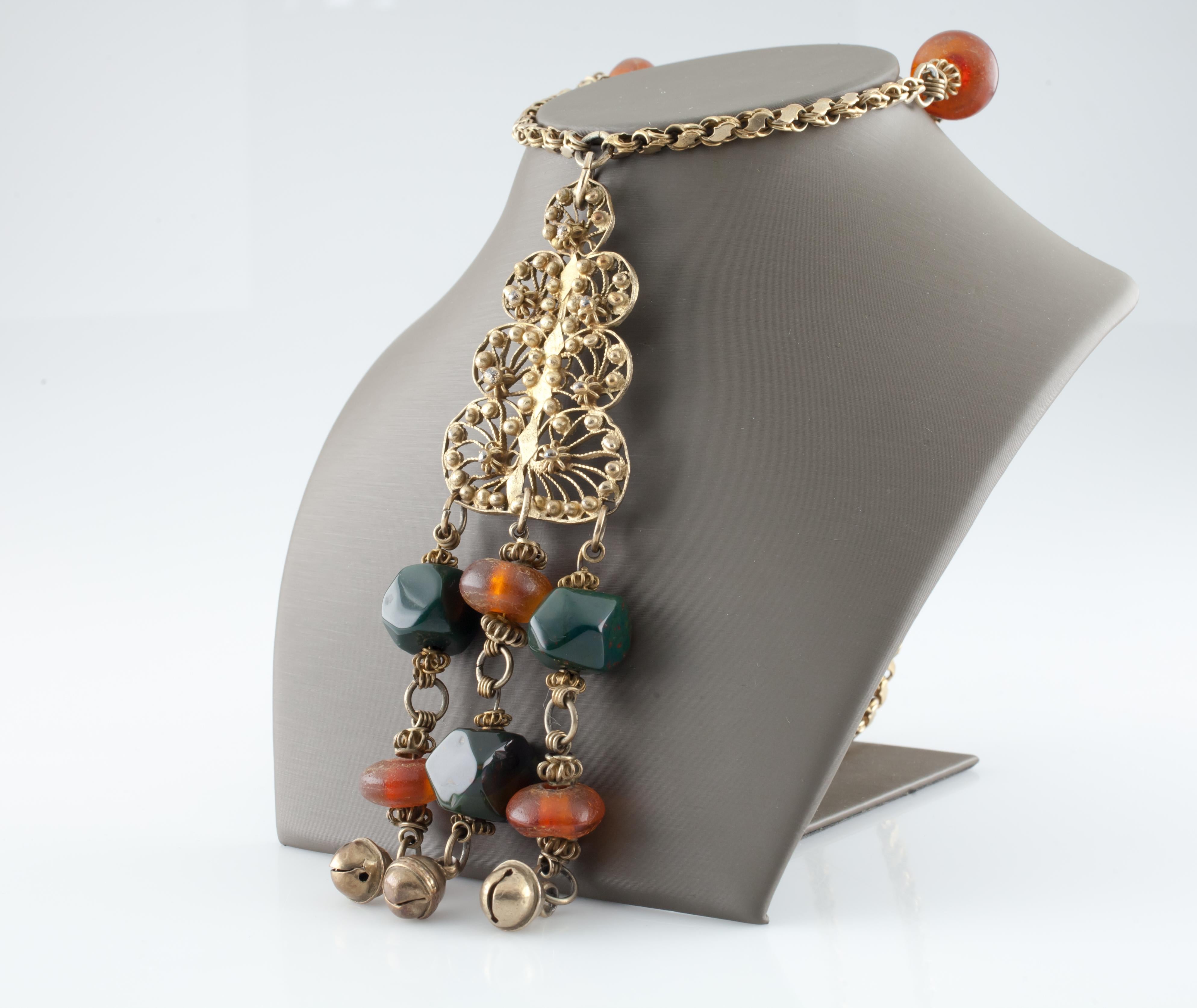 Gorgeous filigree gold-plated Bedouin necklace.
Features amber and bloodstone geometric beads.
Length: 30 inches.
Pendant: 132 x 37 mm.
Weight: 76.1 grams.