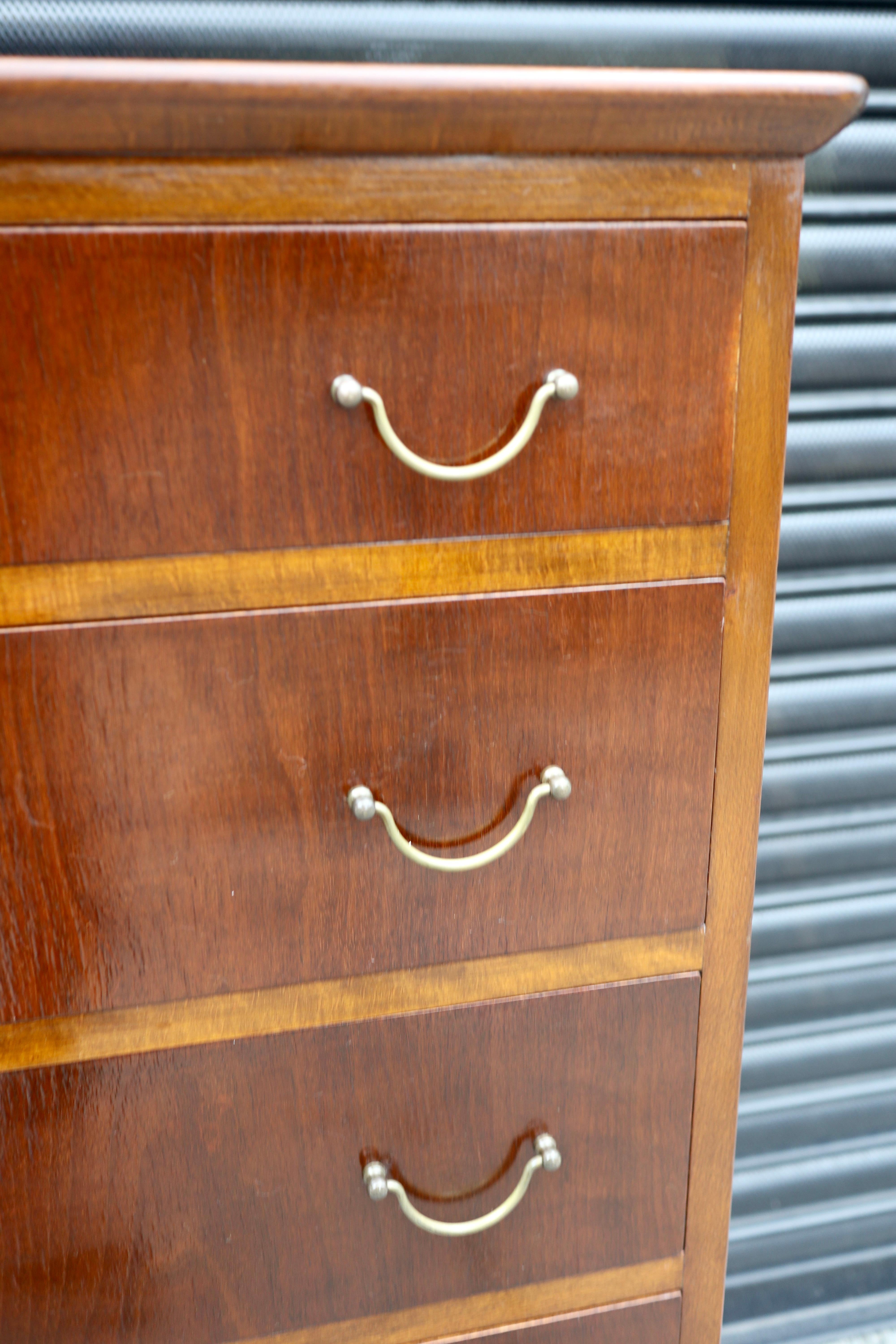 20th Century Vintage beech 1950s English 'tall boy' chest of drawers with brass handles For Sale
