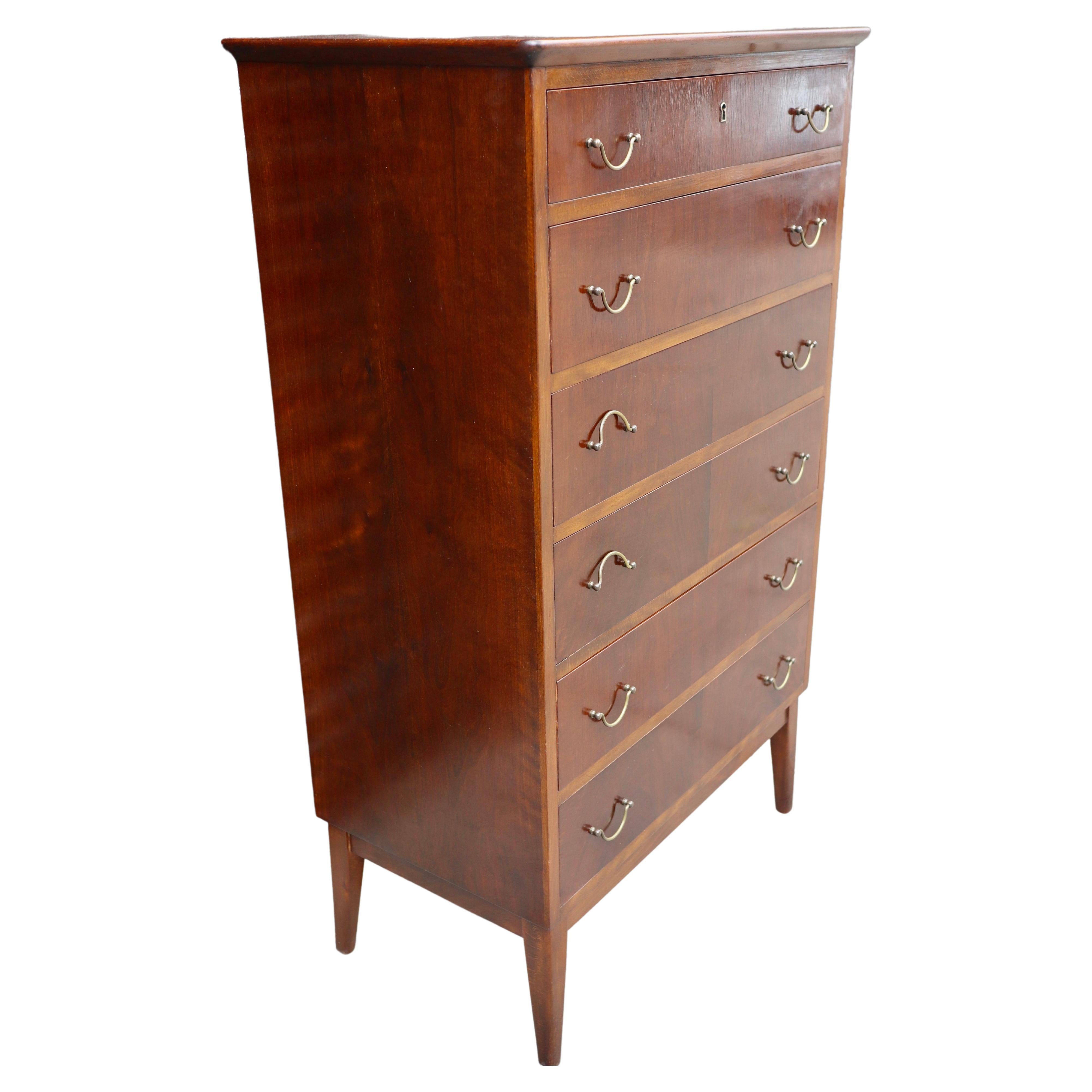 Vintage beech 1950s English 'tall boy' chest of drawers with brass handles For Sale