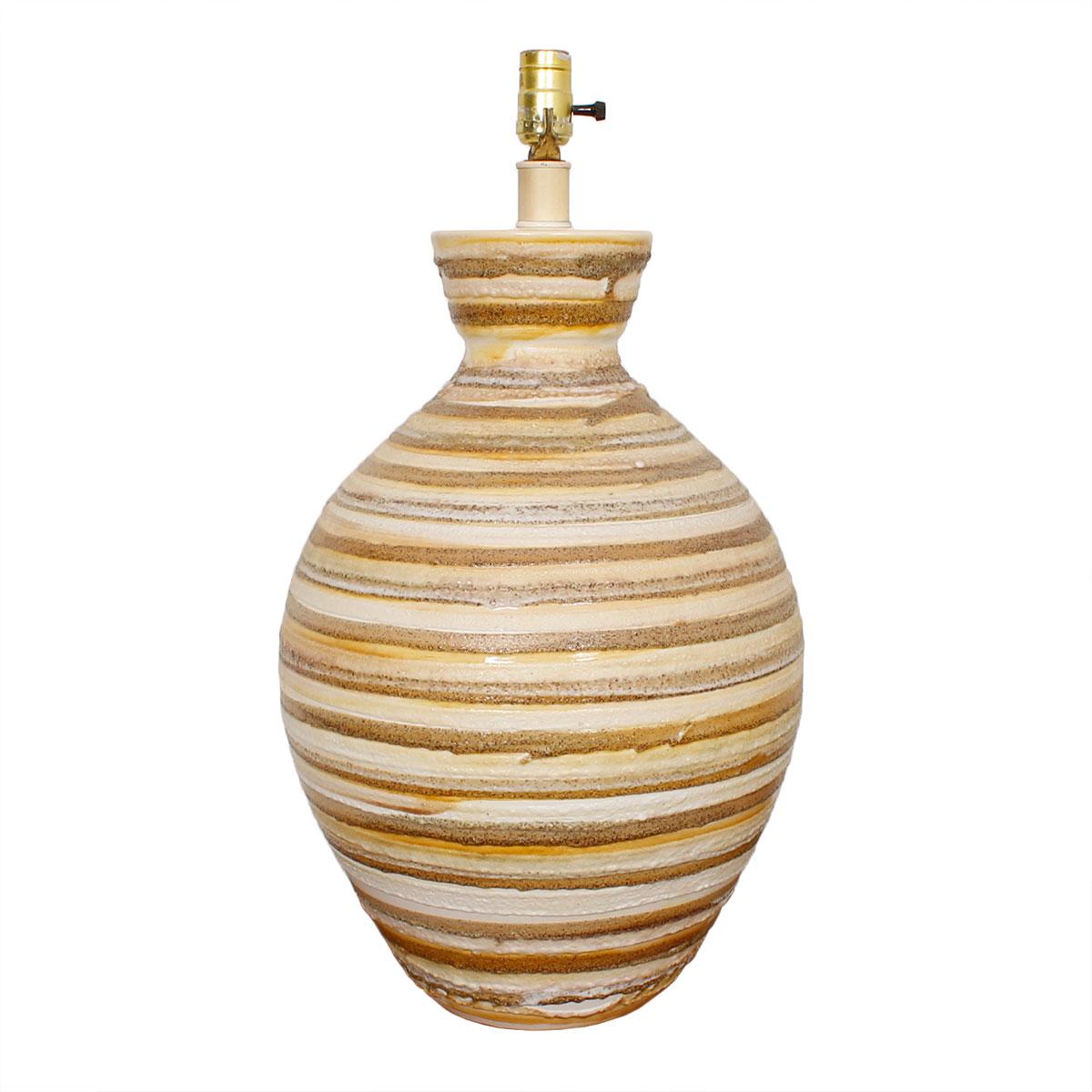 Vintage ‘Beehive’ Striped Lava-Textured Lamp

Additional information:
Material: Lava, Textured
Featured at DC:
Impressively-sized table lamp will make a statement in your room.
A pleasing bulb form, which has been painted around in variegated