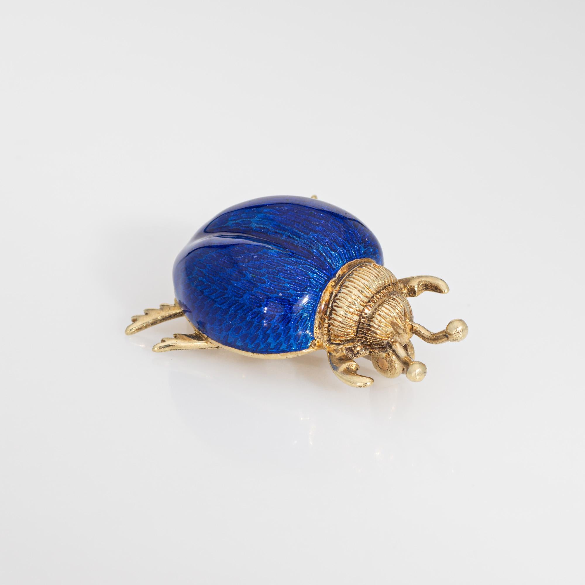 Finely detailed vintage beetle brooch, crafted in 14 karat yellow gold.  

The finely detailed beetle features vibrant royal blue enamel to the back, with textured antennae and claws. Simple and sweet, the beetle is ideal worn on a lapel or shirt