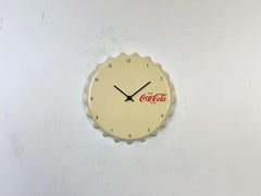 Horloge murale beige publicitaire Coca Cola, 1970