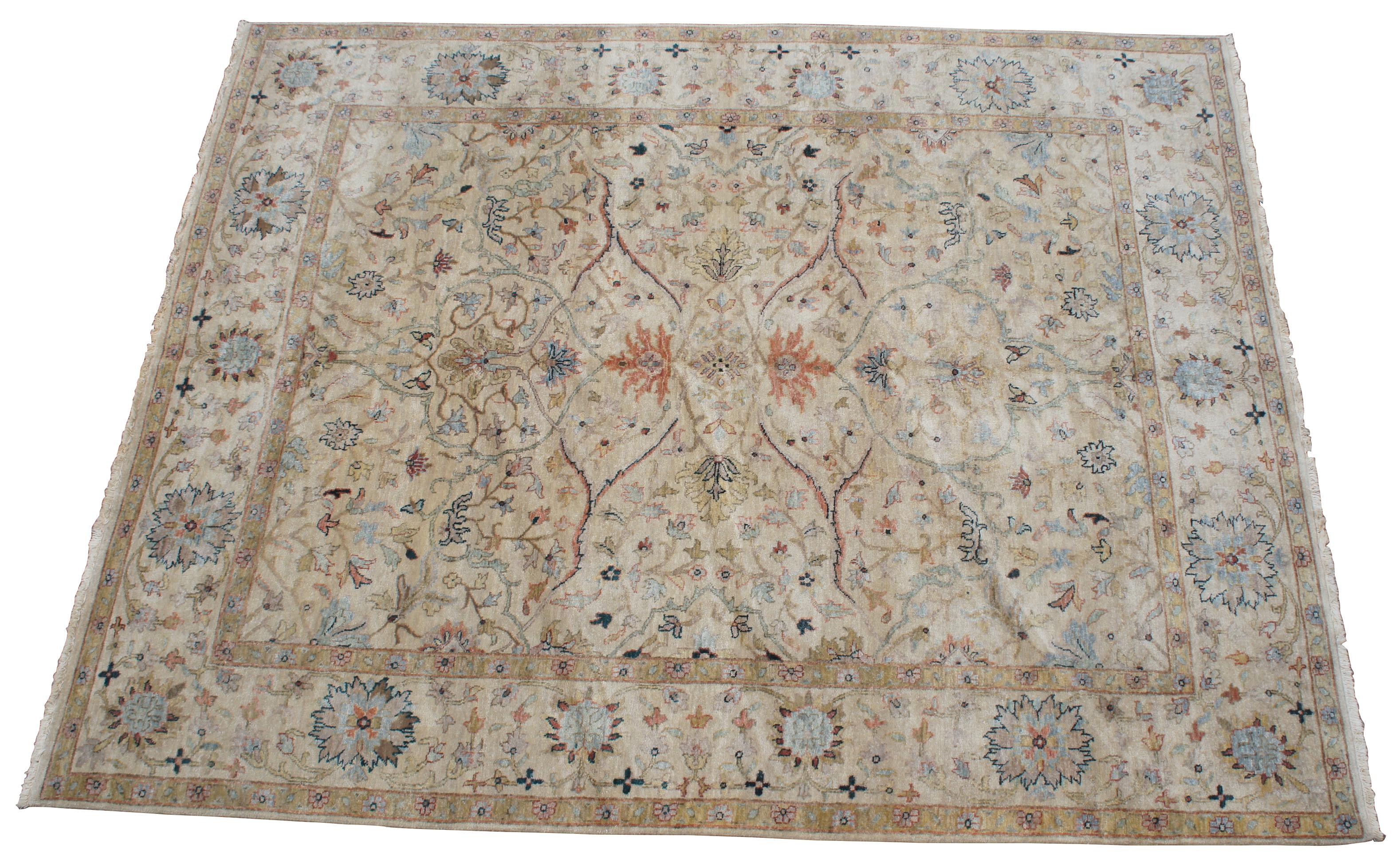 Vintage floral all-over area rug. Features beige / tan, reds / pinks, greens, blues. Measures: 8' x 10'.
 