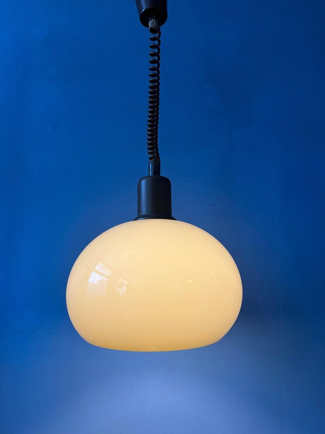 Vintage space age mushroom pendant lamp in beige colour. The acrylic glass shade produces a magnificent glow. The height of the lamp can easily be adjusted with the suspension mechanism. The lamp requires an E27/26 (standard) lightbulb.

Additional