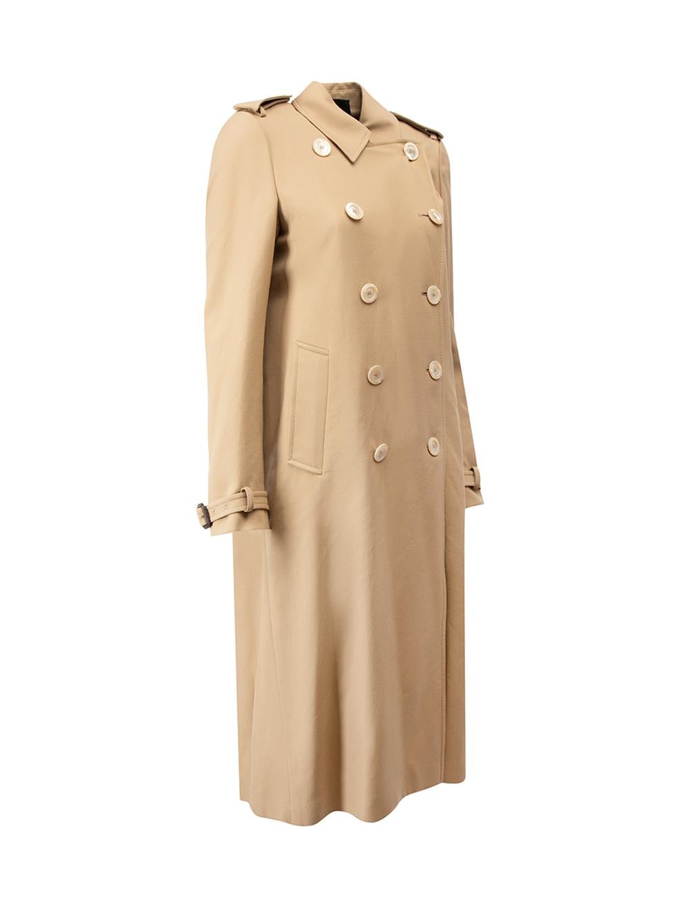 CONDITION is Never Worn. No visible wear to coat is evident on this used Gucci designer resale item. This item comes with original garment bag.



Details


Beige

Wool

Long trench coat

Double breasted

Buckled straps on cuffs

Back pleated