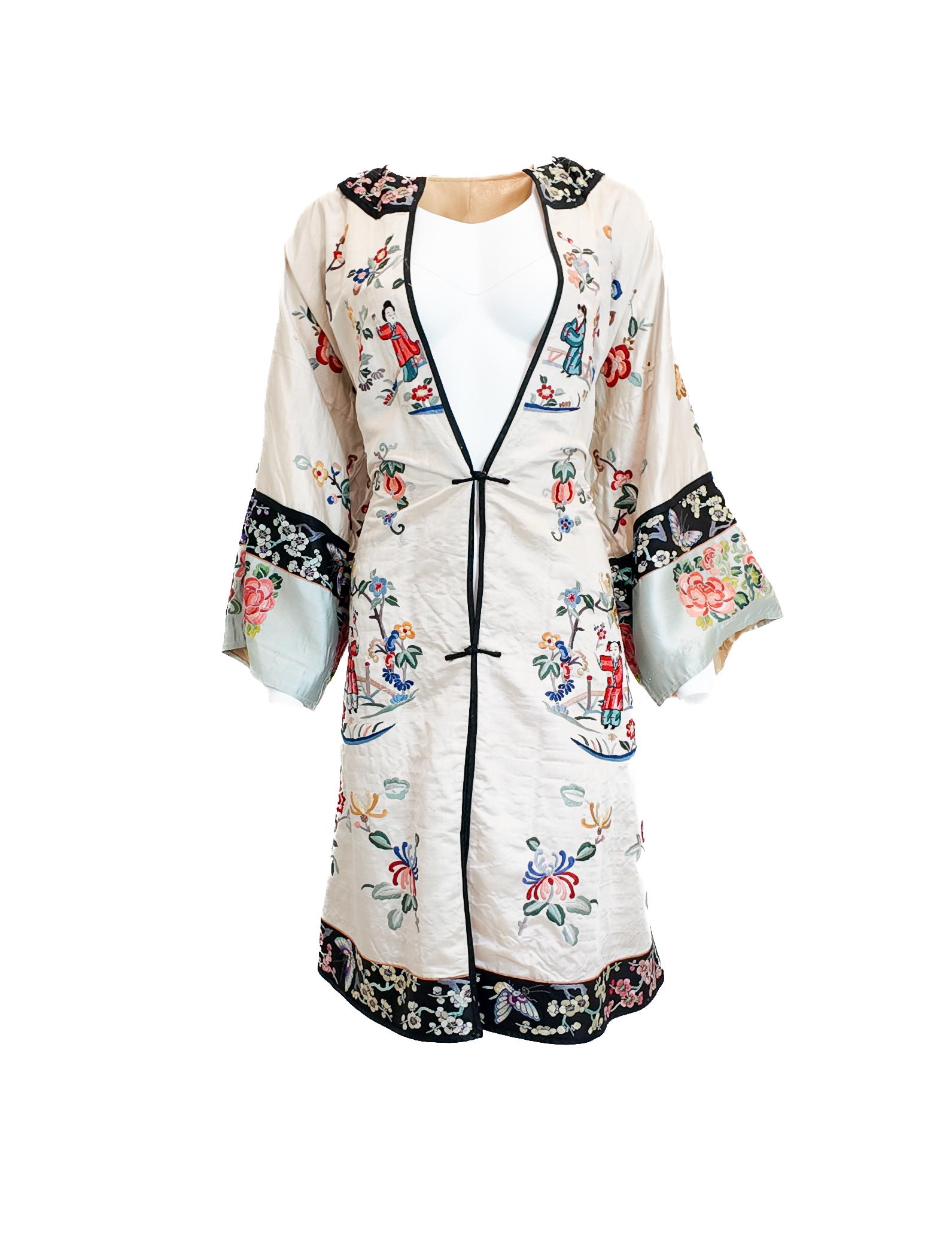 This vintage beige silk kimono coat showcases exquisite traditional Japanese embroidery, embodying timeless elegance. Crafted from lightweight silk, it offers breathability and comfort, making it ideal for summer ceremonies. Its classic design