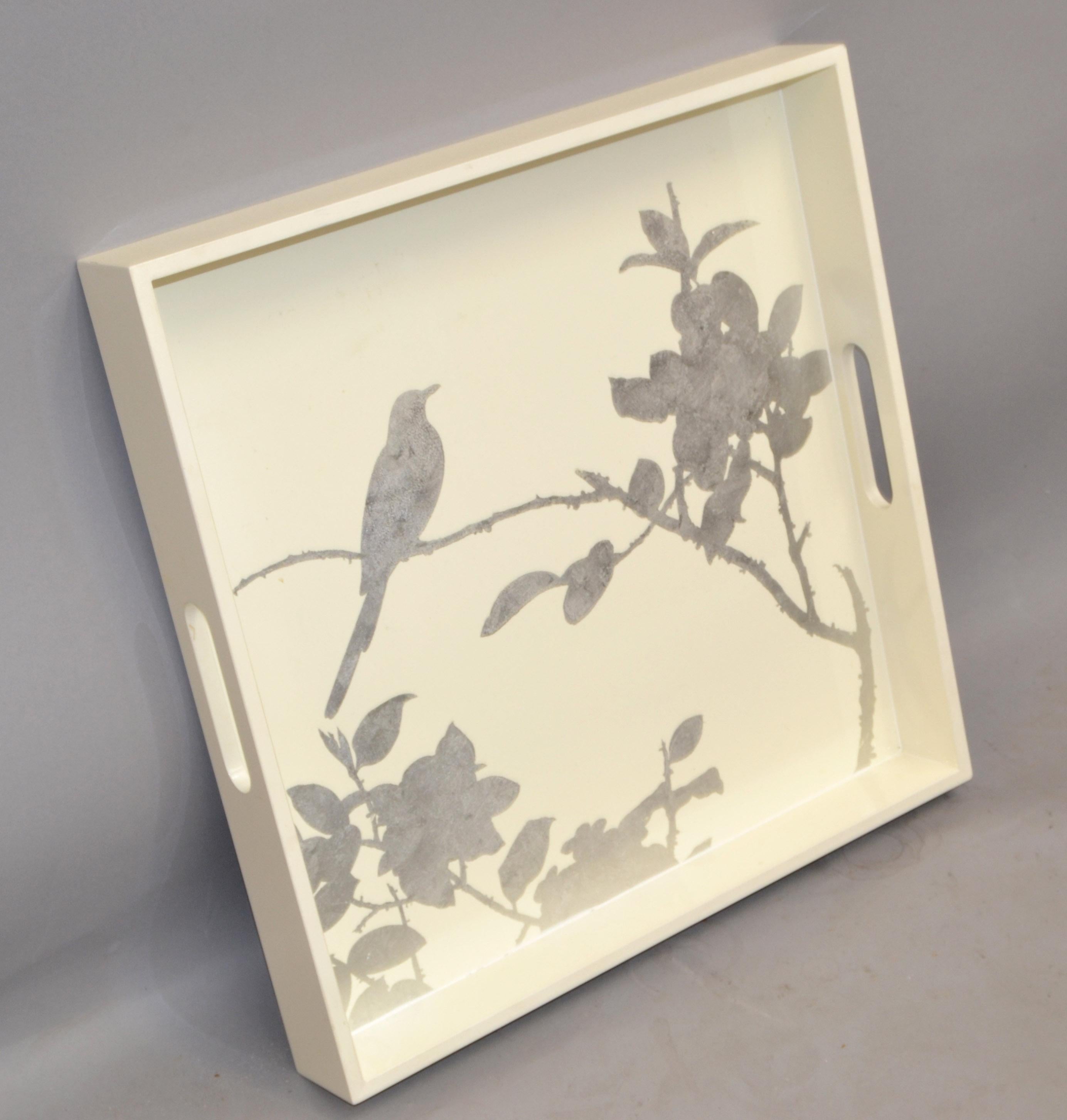Japanese Style Square Vintage Serving Tray, Barware in Cream Color Finish Wood with hand-painted Silver Leaf Motif.
Depicting a Bird resting on a Flower Bush. Mid-Century Modern Period with Asian Modern Fine Art Painting. 
In very good condition