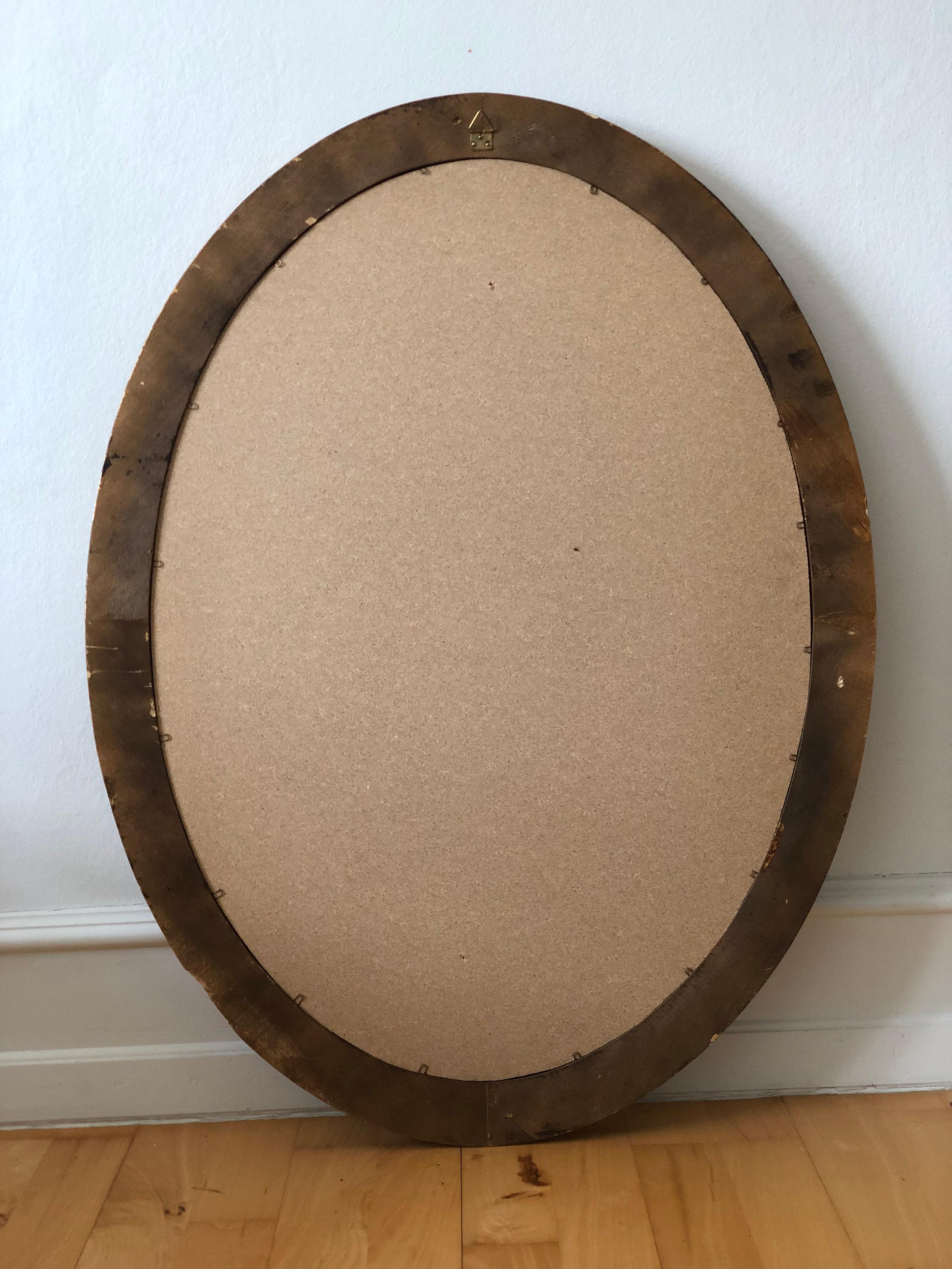 Verre taillé Miroir ovale en bois doré en vente