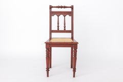 Sedia belga d’epoca tornita  Sedia in legno degli anni ’40 con seduta in rattan nuova