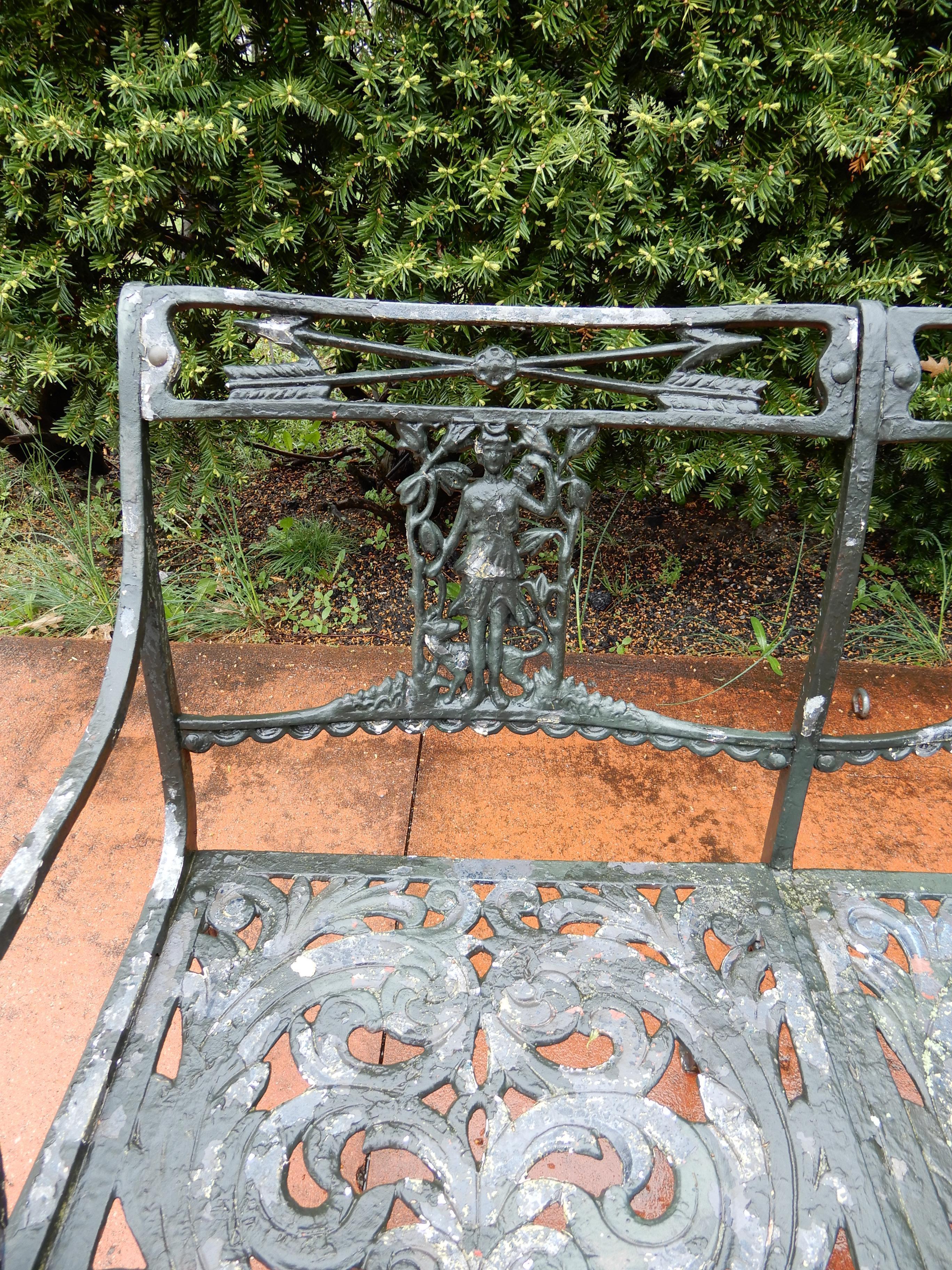 A vintage garden bench by Molla in the unusual “Diana the Huntress” pattern. This bench is made of cast aluminum which Molla was known for. This bench is a 3-seat and maintains its original painted finish exhibiting paint loss. Even though there is