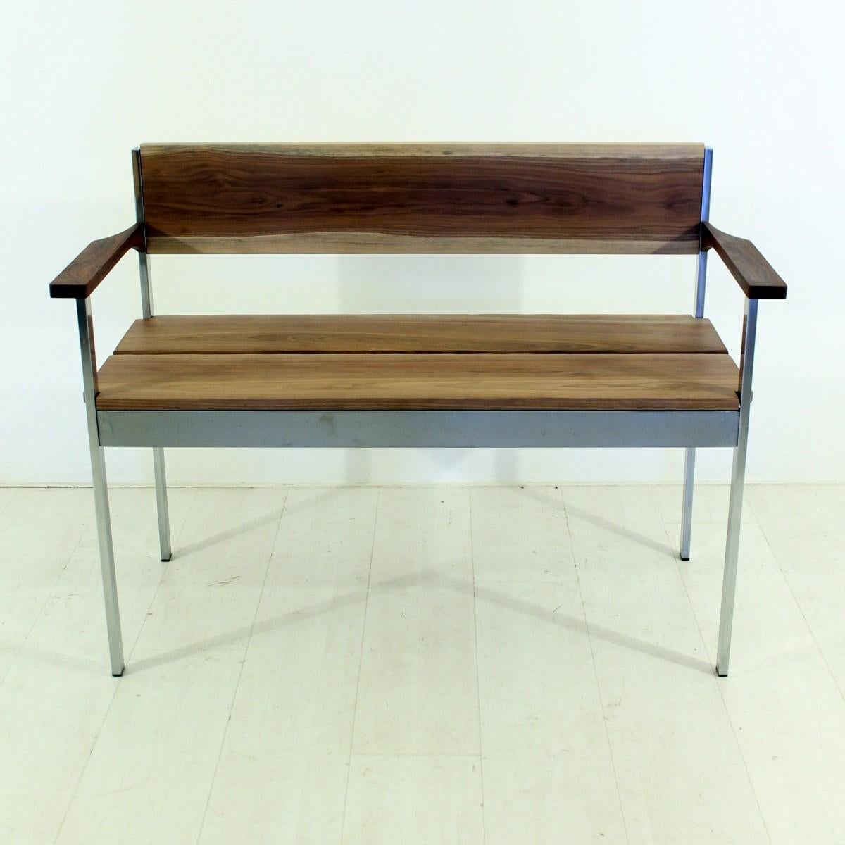 - Vintage bench in solid walnut
- Features armrests dark teak
- Honed and oiled
- Non-toxic wood worm treatment.