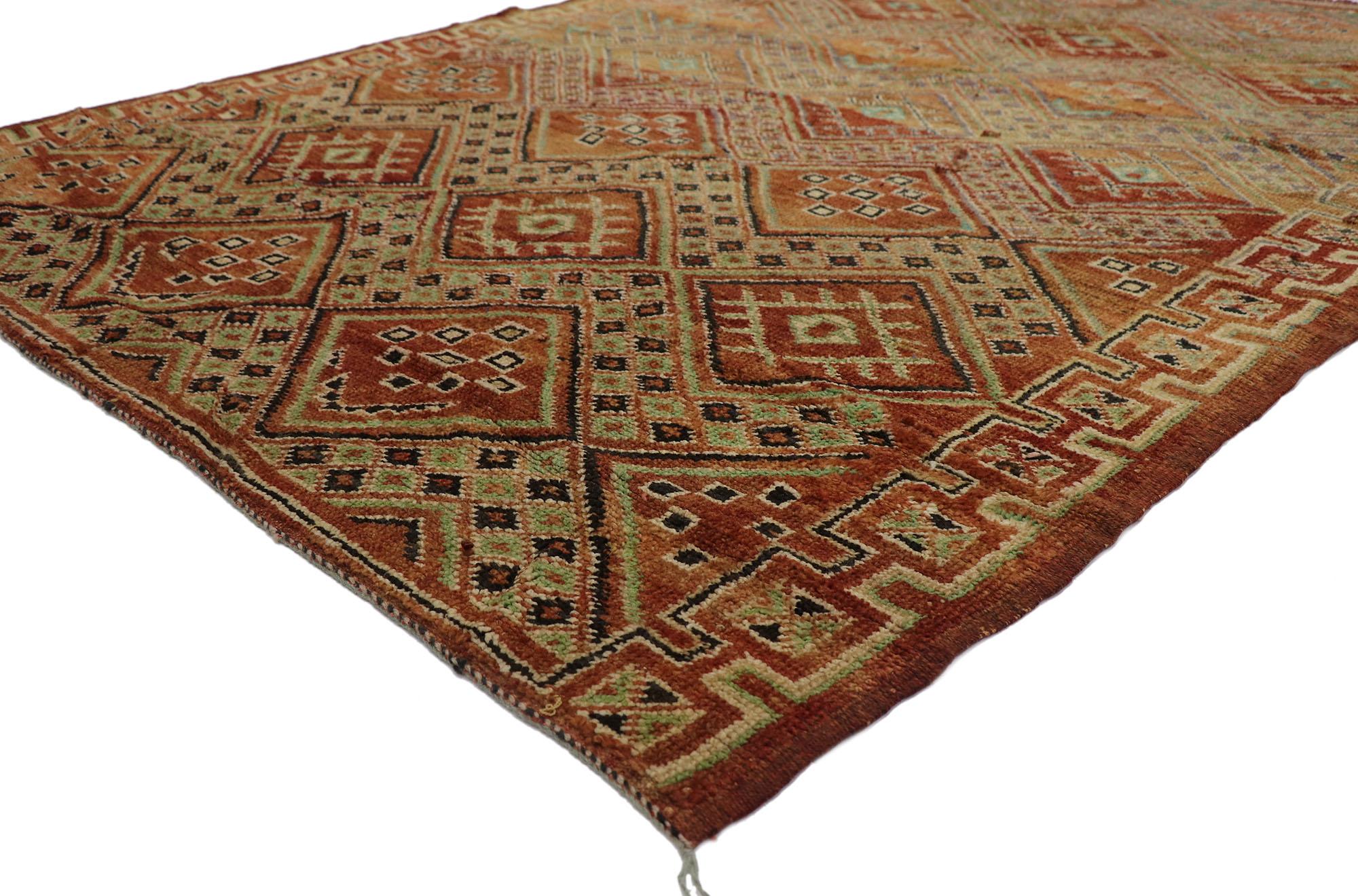 212250 Vintage Berber Moroccan Rug, ​05'10 x 08'01.
Elegant warmth meets nomadic charm in this hand-knotted wool vintage Moroccan rug. The visual complexity and rich earth-tone colors woven into this piece work together to bring forth a sense of