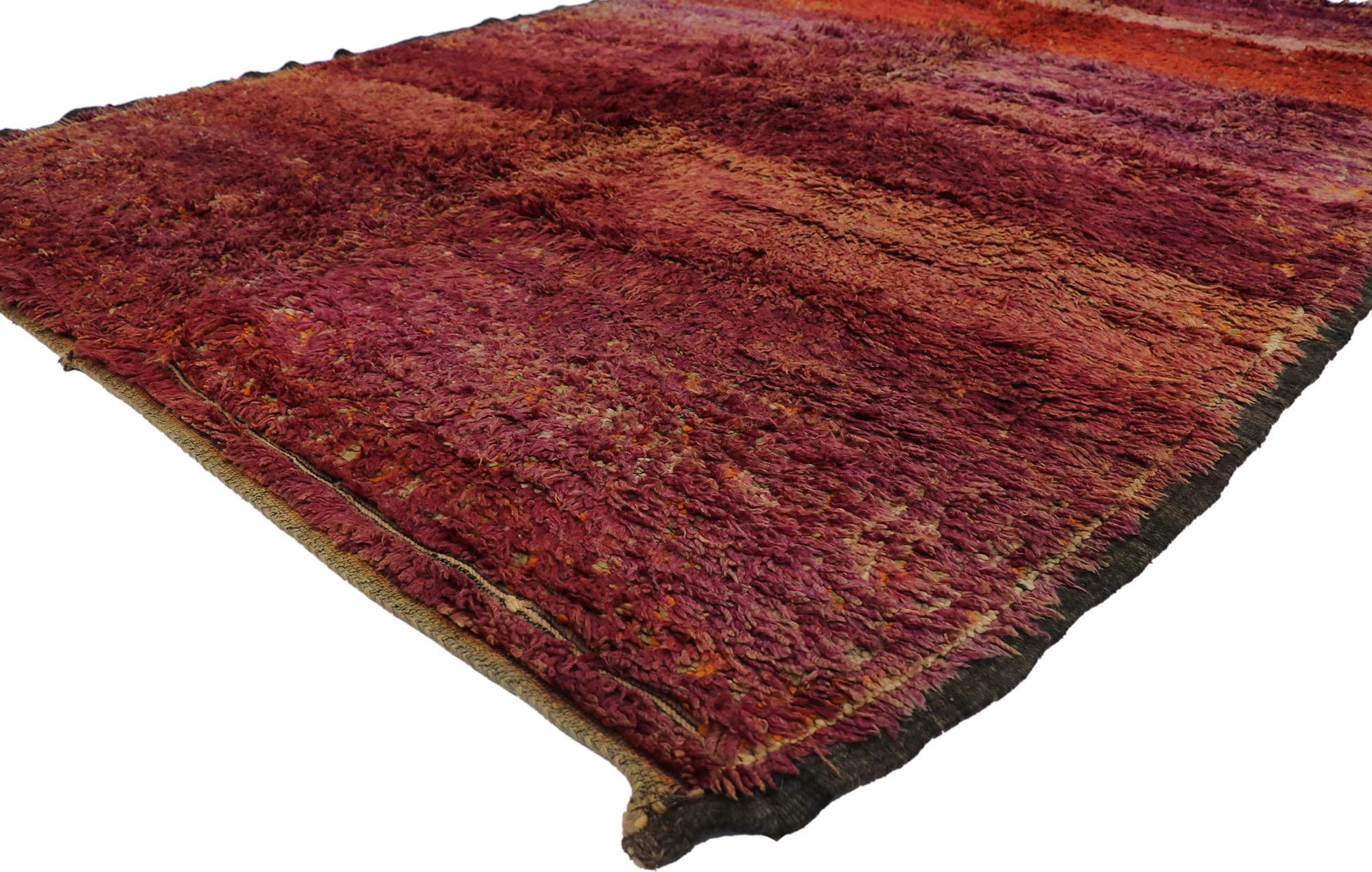 21418 Vintage Beni M'Guild Moroccan Rug, 06'10 x 10'02.
With its simplicity, plush pile and tribal style, this hand knotted wool vintage Beni M'Guild Moroccan rug is a captivating vision of woven beauty. The abrashed field features an all-over