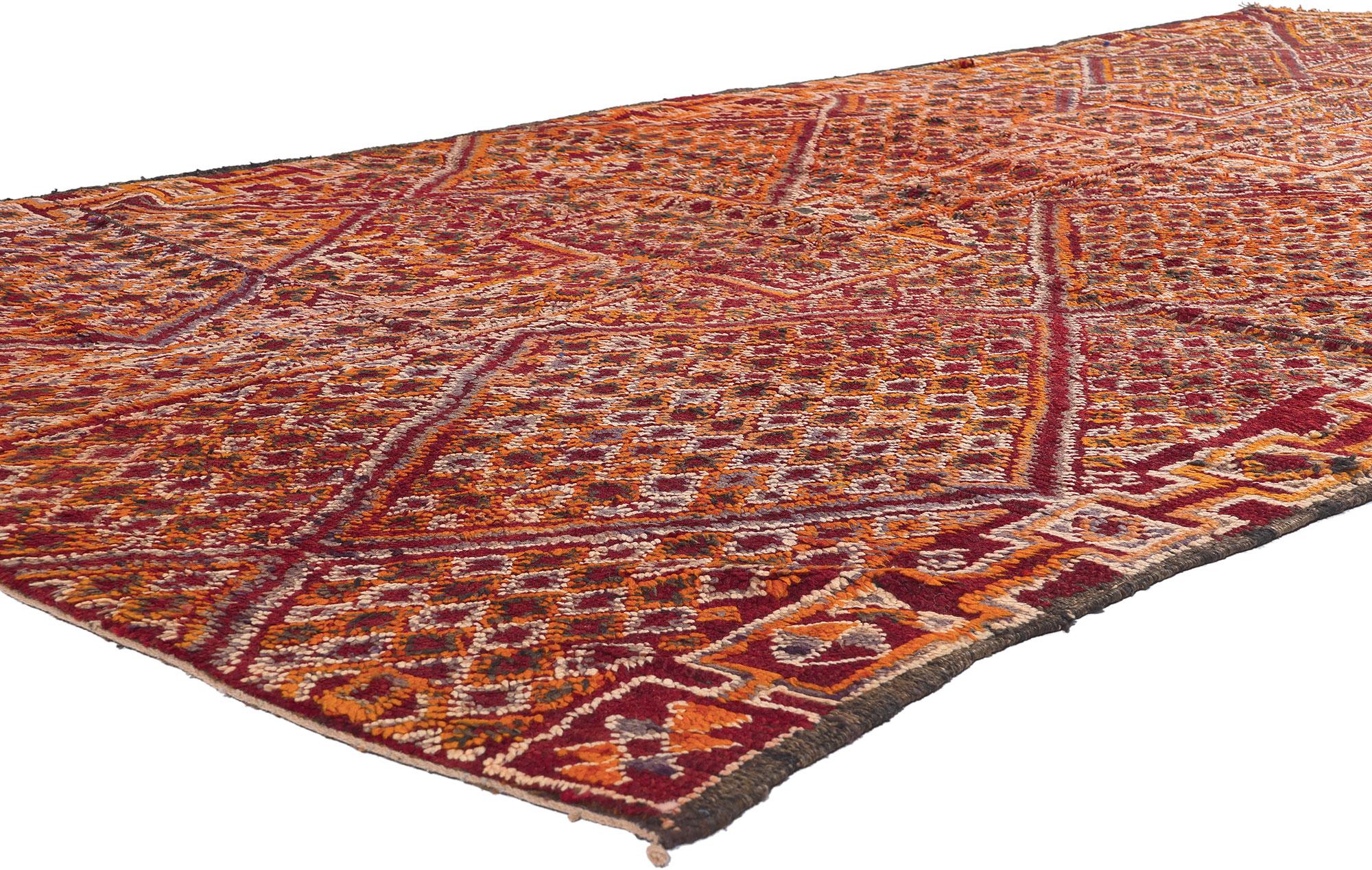 21264 Vintage Orange Beni MGuild Moroccan Rug, 05'08 x 11'03. Nestled within the enchanting embrace of Morocco's Atlas Mountains, the skilled hands of Berber women from the Ait M'Guild tribe weave captivating tales through the intricate artistry of