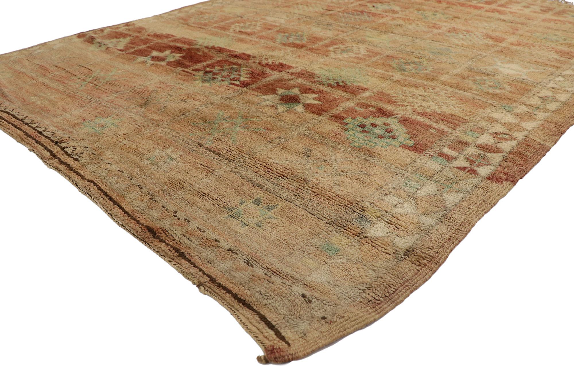21442 Vintage Beni MGuild Moroccan Rug, 06'06 x 08'07.
Spicy global style meets organic modern in this hand knotted wool vintage Beni MGuild Moroccan rug. The esoteric symbolism and nature-inspired colors woven into this piece work together creating