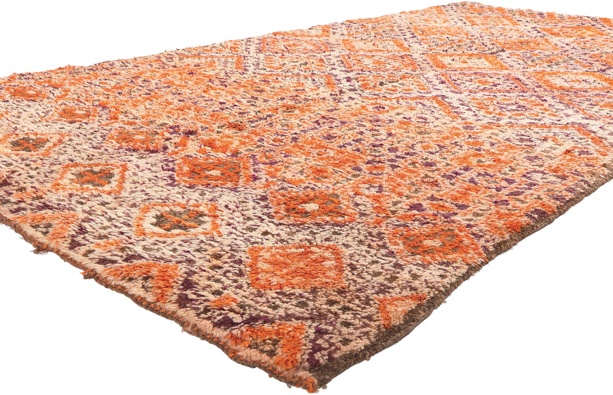 21298 Vintage Beni MGuild Moroccan Rug, 05'07 x 10'10. 
In the magical expanse of the Atlas Mountains in Morocco, the skilled hands of Berber women from the Ait M'Guild tribe weave the enchanting tales of Beni Mguild rugs. These exquisite creations,