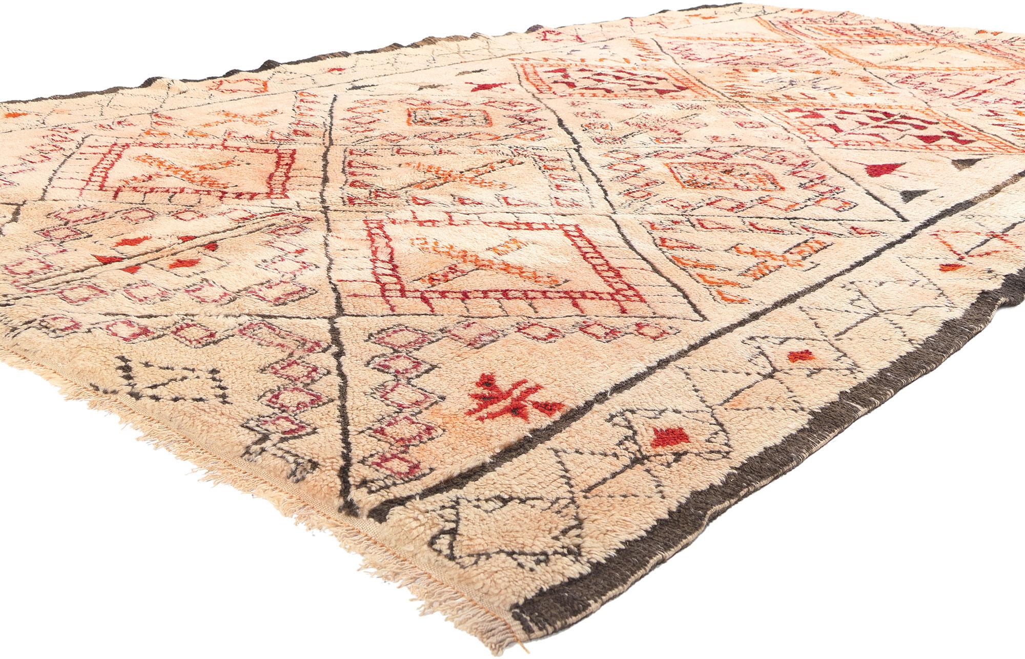 20243 Vintage Moroccan Beni Ourain Rug 06'07 x 11'08.
Nomadic charm collides with Midcentury Modern style in this hand knotted wool vintage Moroccan Beni Ourain rug. The meticulous tribal design and earthy colors woven into this piece work together