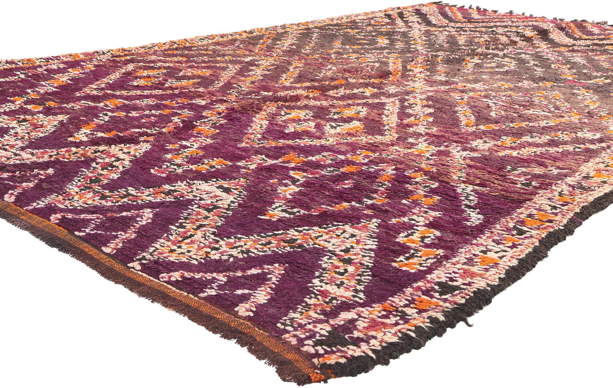 20090 Vintage Beni MGuild Moroccan Rug, 06'07 x 11'07.
Embark on a journey through woven beauty with this hand-knotted wool vintage Beni MGuild Moroccan rug, an eloquent testament to bold design, intricate detail, and captivating texture. The