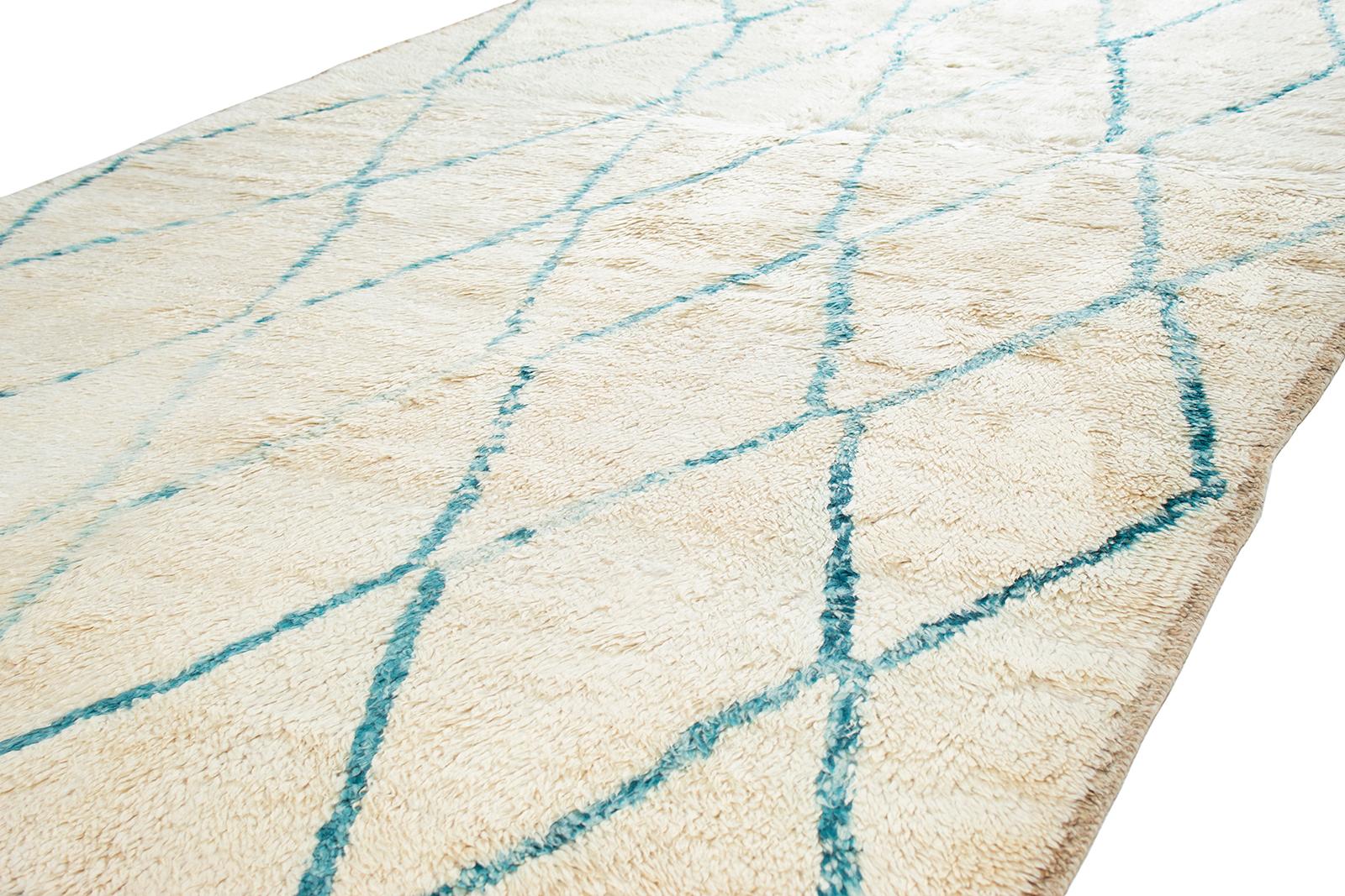 Our vintage Moroccan rugs are part of a skillfully curated collection of rare and unusual designs. They are made of all-natural dyes and 100% handspun wool from the Atlas Mountain region in North Africa. These rugs are all one-of-kind as they were