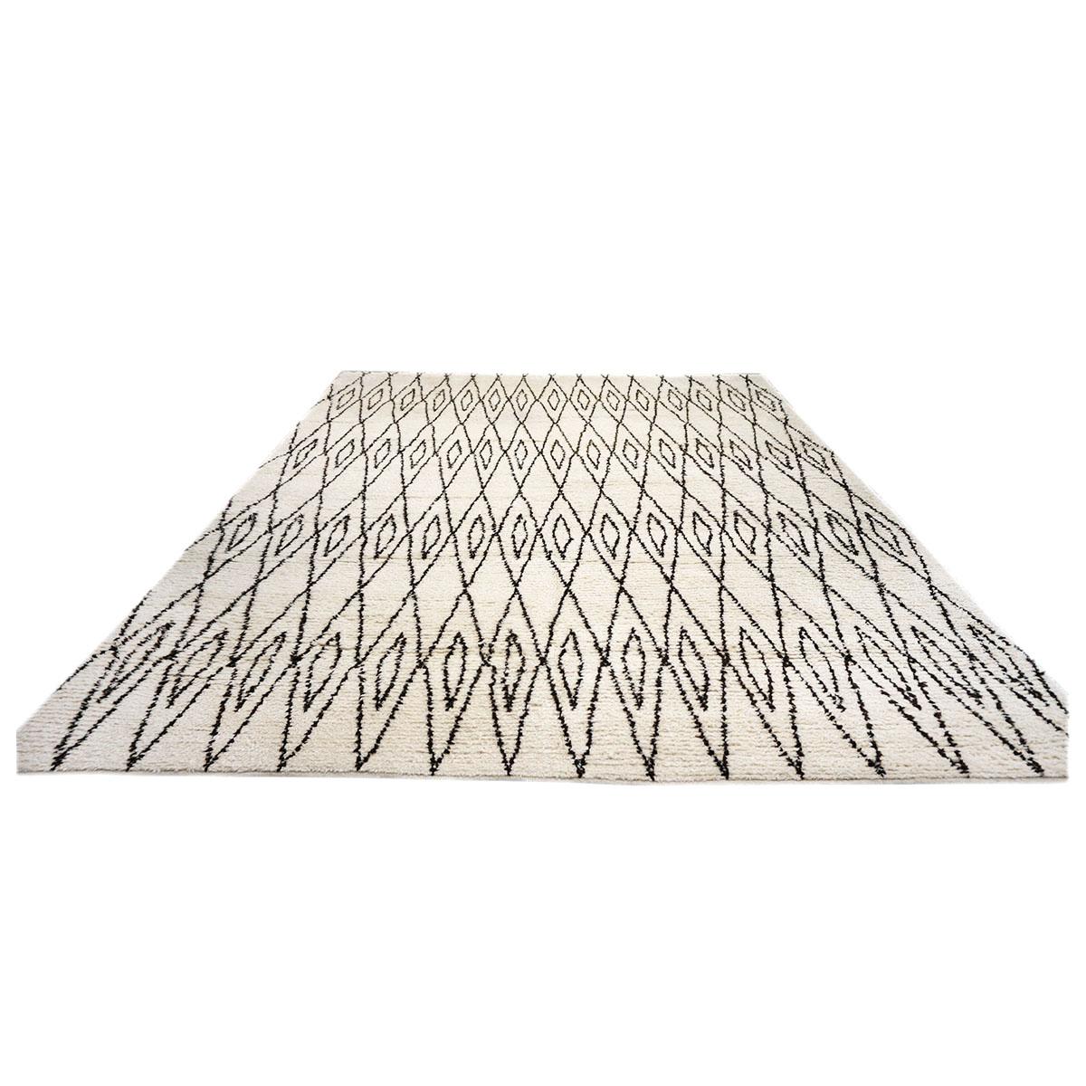 Ashly Fine Rugs presents a Vintage Beni Ourain Modern Morrocan 12x18 Ivory & Dark Brown Handmade Area Rug. Beni Ourain rugs are some of the most popular and sought-after types of Moroccan rugs. These pieces are known for their minimalist, geometric