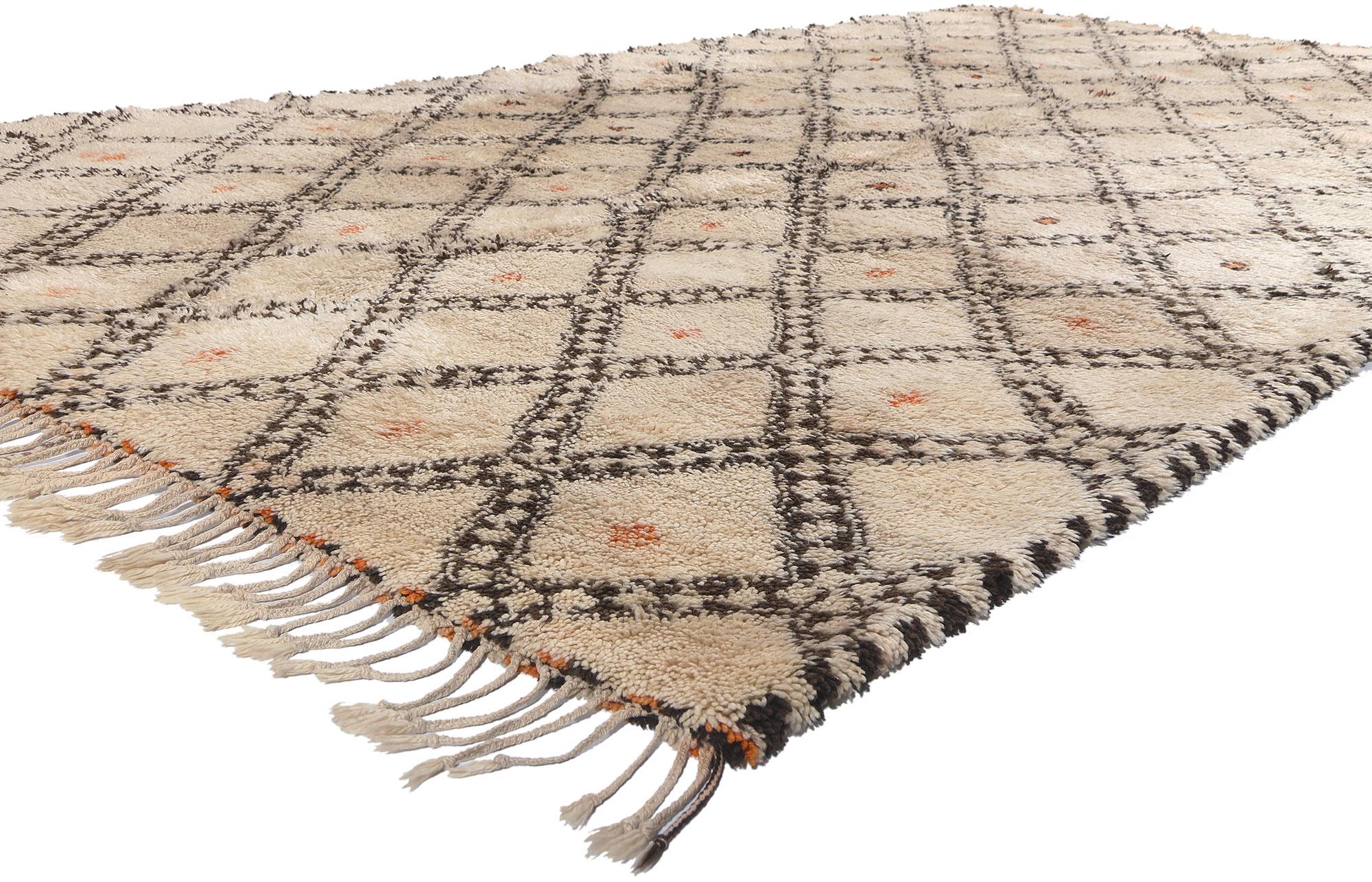 20852 Vintage Moroccan Beni Ourain Rug, 06'08 x 12'02. Mid-Century Modern design seamlessly intertwines with tribal allure in this hand knotted wool vintage Moroccan Beni Ouarain rug. The diamond trellis and subdued hues woven into this piece