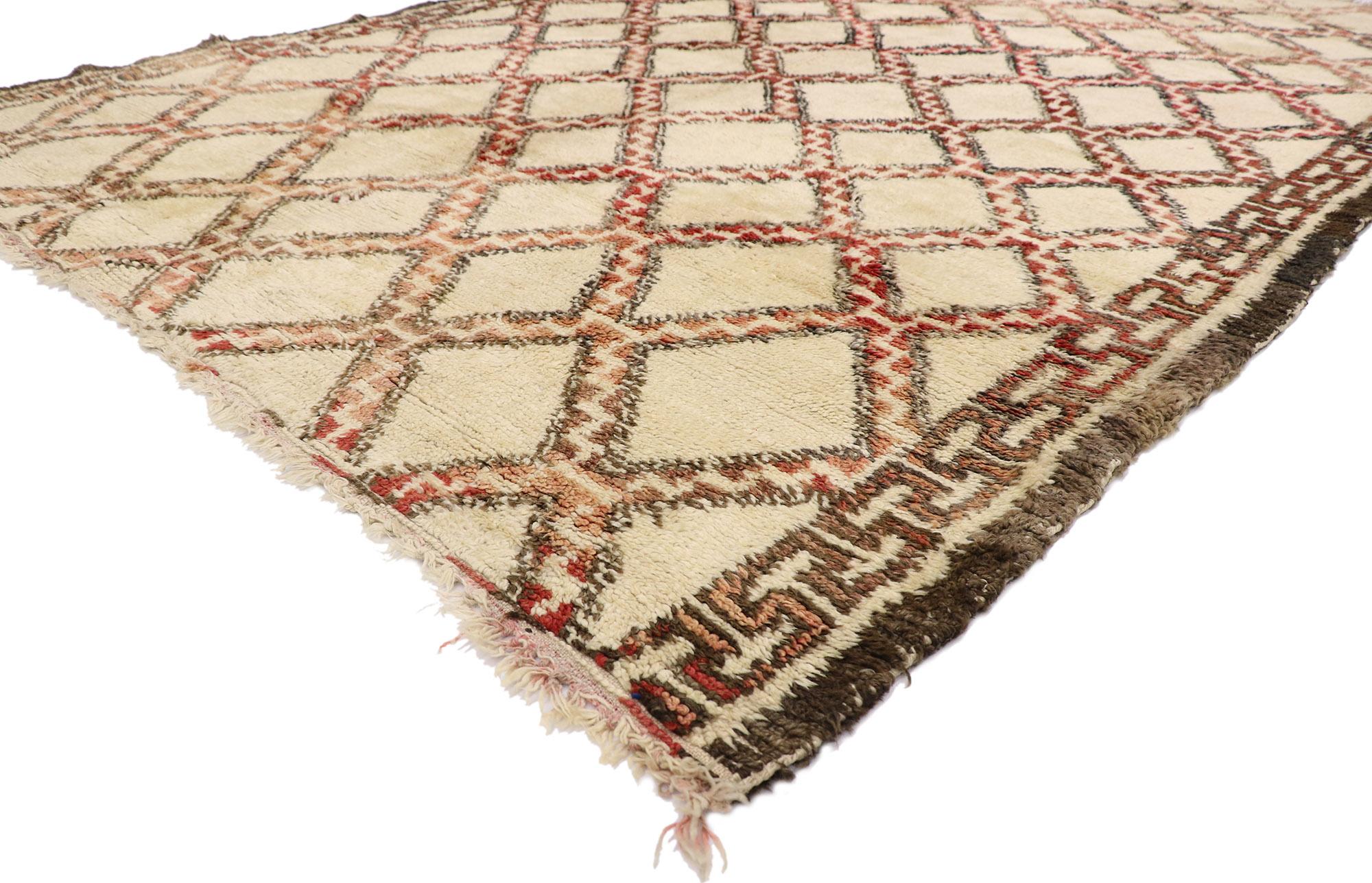 21411 vintage Berber Moroccan Beni Ourain rug 07'00 x 10'05. ?With its simplicity, plush pile and Mid-Century Modern style, this hand knotted wool vintage Berber Beni Ourain Moroccan rug is a captivating vision of woven beauty. It features a lozenge