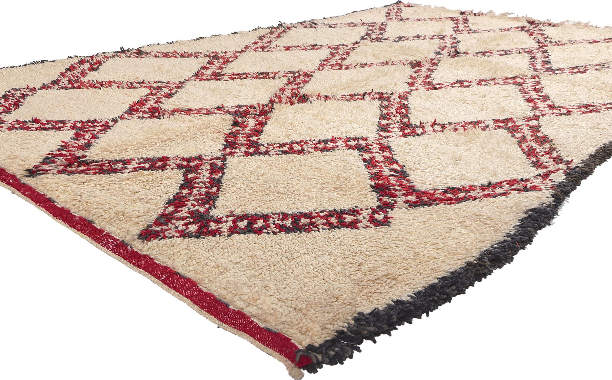 20291 Vintage Moroccan Beni Ourain Rug, 05'09 x 09'11. This vintage Moroccan rug hails from the Beni Ourain tribe, an integral part of the broader Berber ethnic group in Morocco. Meticulously crafted from natural, undyed sheep's wool, these rugs are