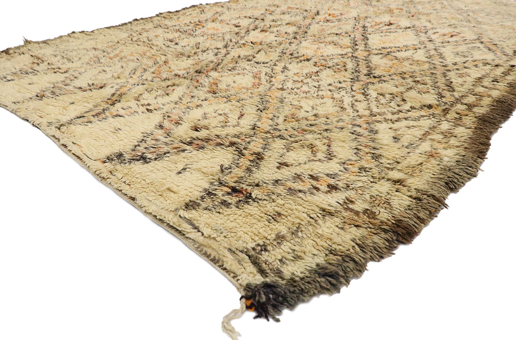 21412 Vintage Beni Ourain Moroccan Rug, 06'07 x 09'09. Cozy Boho meets nomadic charm in this hand knotted wool vintage Beni Ourain Moroccan rug. The intrinsic lattice design and earthy colorway woven into this piece work together creating an ultra