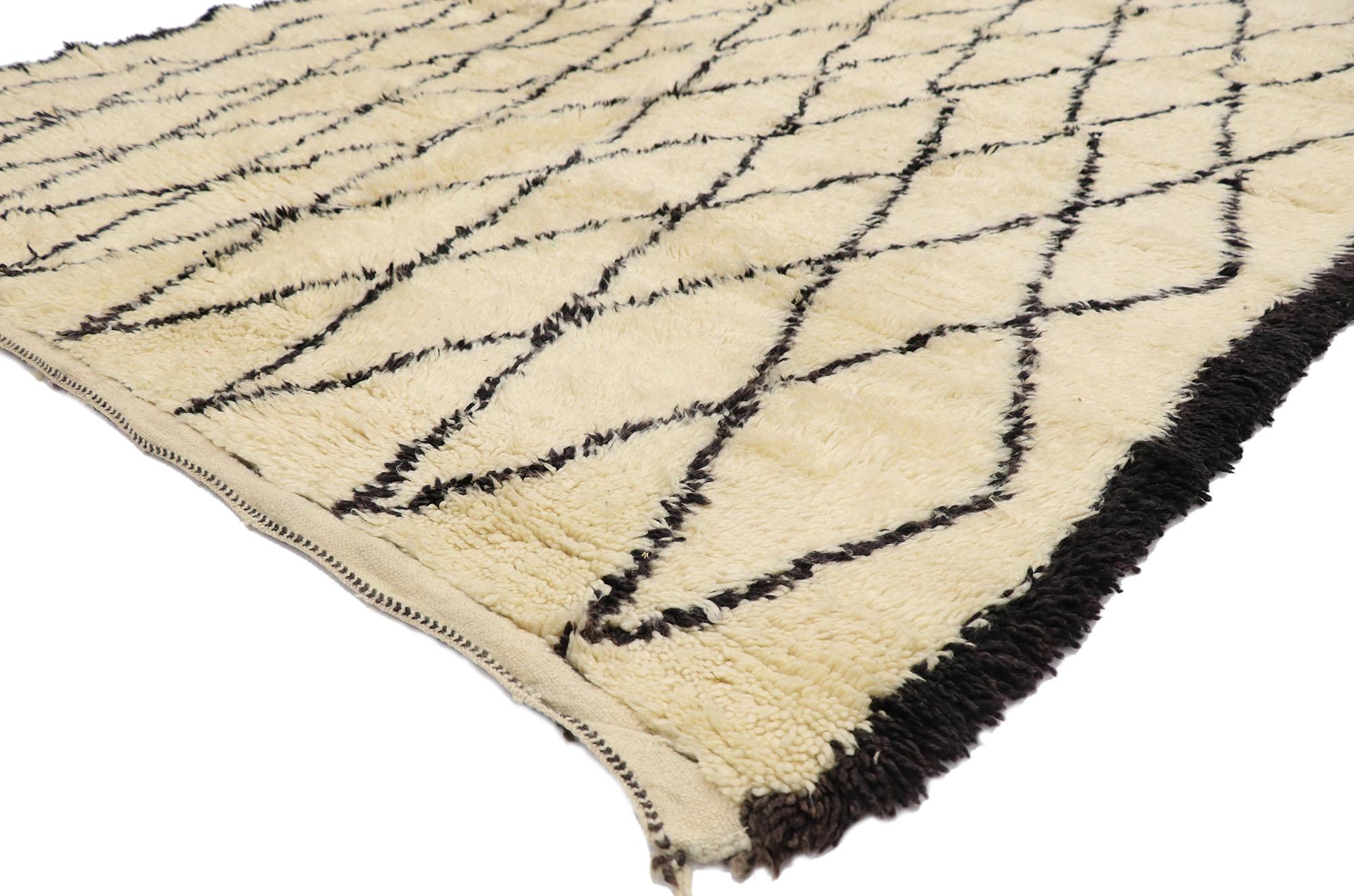 21349 Vintage Beni Ourain Moroccan Rug, 06'05 x 07'04.
Wabi-Sabi meets Shibui in this hand knotted wool vintage Moroccan Beni Ourain rug. The perfectly imperfect lattice design and neutral earthy colors woven into this piece work together to