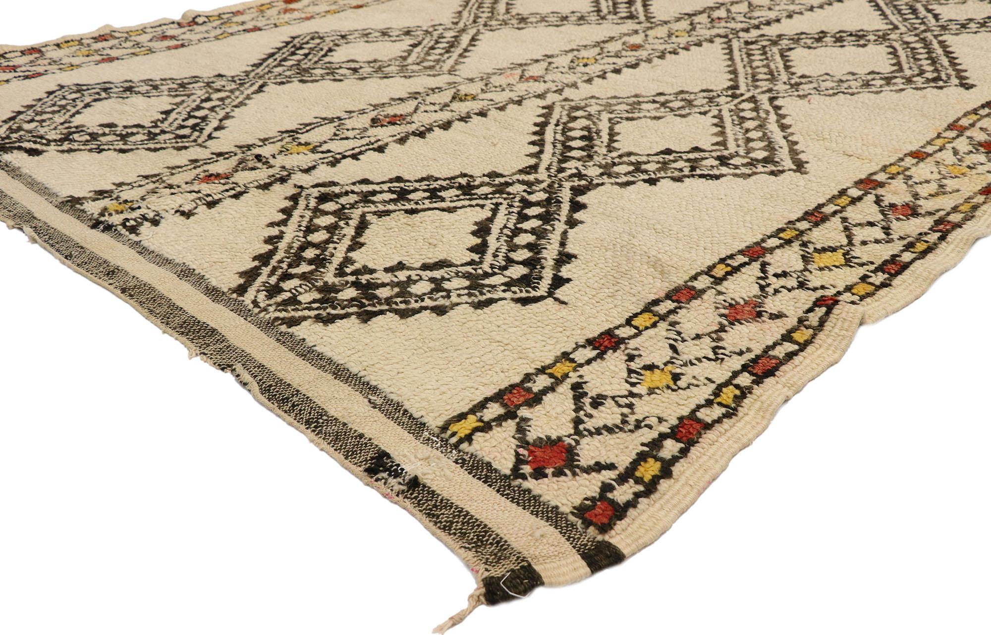 20990, vintage Beni Ourain Moroccan Rug with Mid-Century Modern style and Hygge vibes. With its clean sophistication and Hygge vibes, this hand knotted wool vintage Beni Ourain Moroccan rug provides a feeling of cozy contentment. It features two