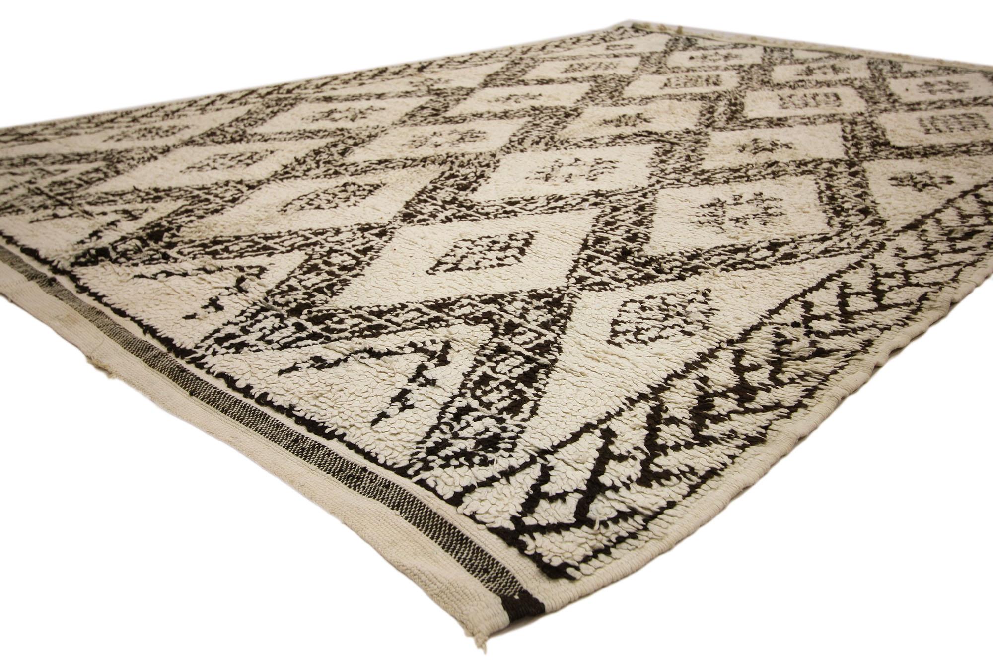 20745 Vintage Moroccan Beni Ourain Rug, 06'03 x 08'09. This hand-knotted wool vintage Beni Ourain Moroccan rug features a lozenge trellis pattern on a neutral background. Bold, thick lines composed of squares form a diamond lattice on a field of