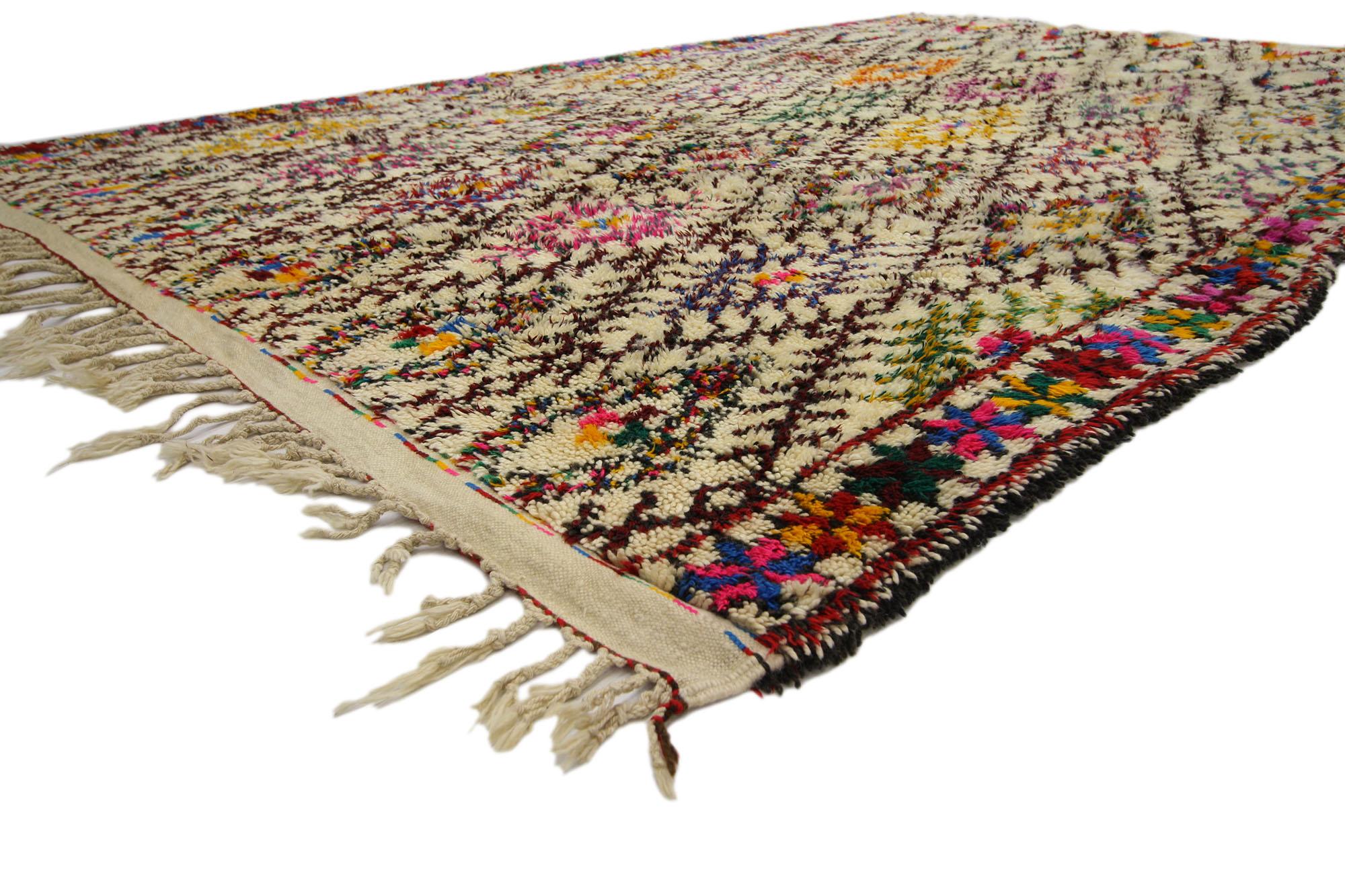 20695 Vintage Moroccan Beni Ourain Rug, 06'07 x 09'10.
Colorfully curated meets boho chic in this hand knotted wool vintage Moroccan Beni Ourain rug. The detailed diamond design and happy hues woven into this piece work creating an ininimitable