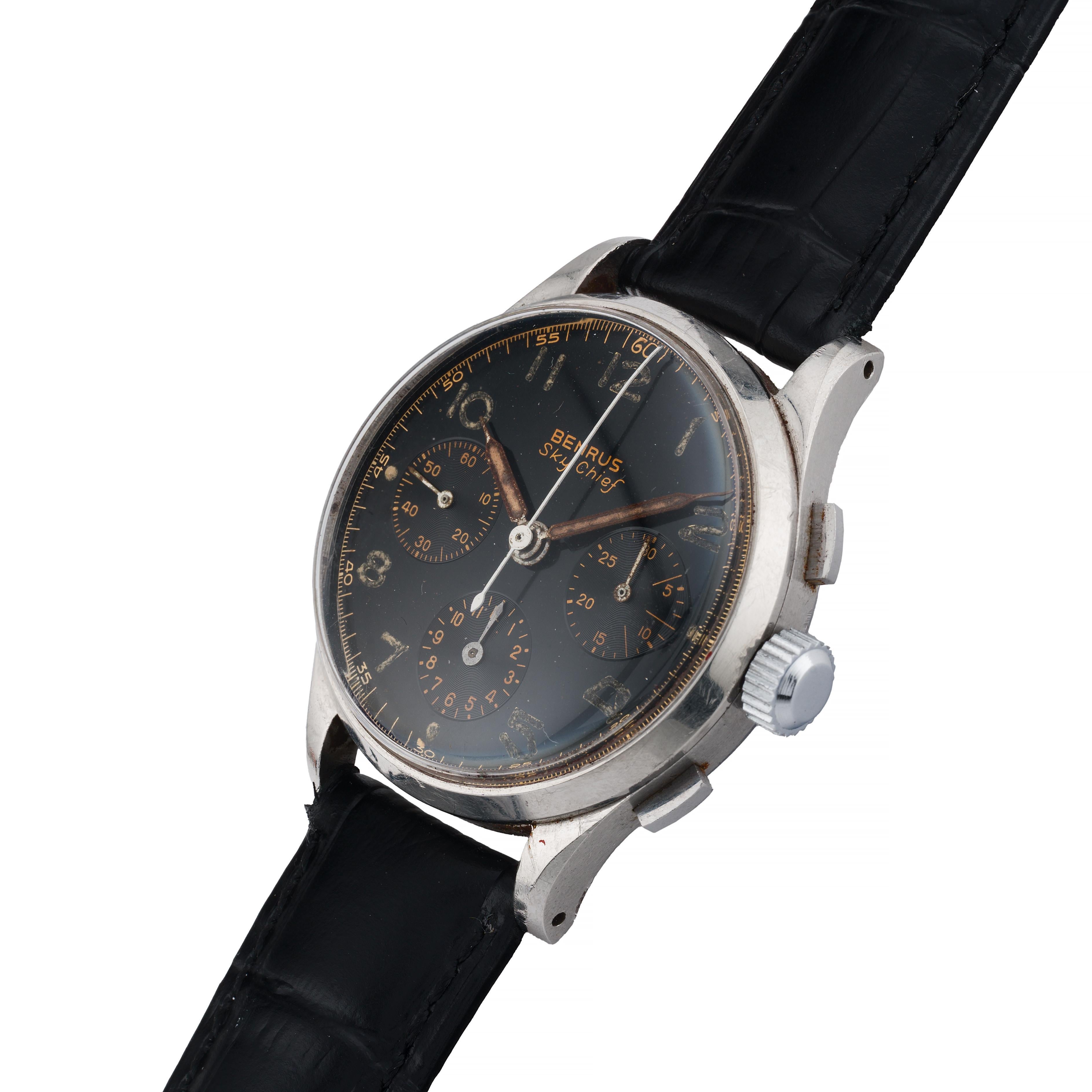 Aston Estate Jewelry Presents:

A Benrus 'Sky Chief' timepiece, crafted in stainless steel circa 1940. This round watch features its original black gilt dial with intricate chronograph sub-dials, accented by bold, luminous markers. The watch is