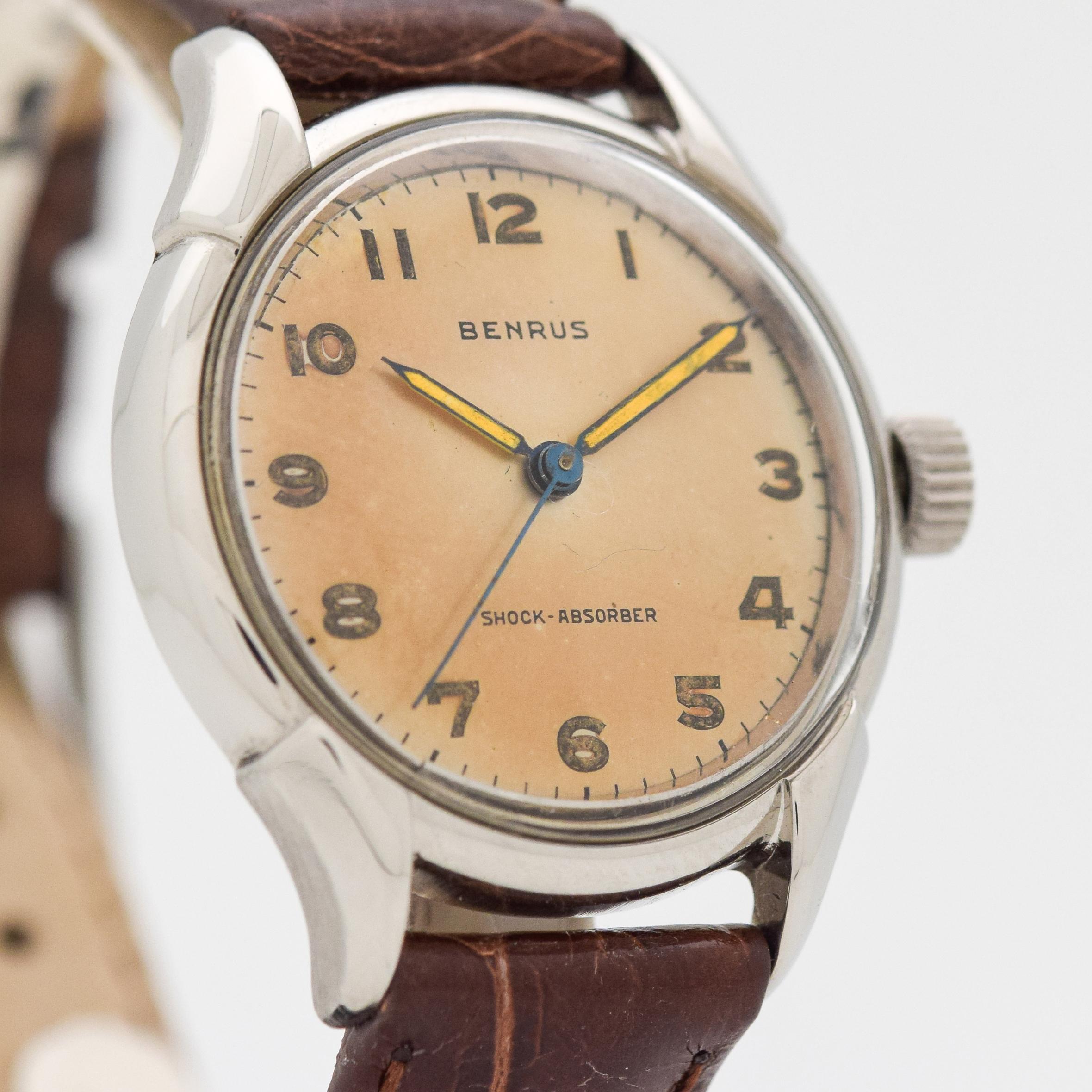 1950's - 1960's Vintage Benrus Stainless Steel watch with Original Patina Silver (Turned Brown) Dial with Arabic Numbers. 32mm x 38mm lug to lug (1.26 in. x 1.5 in.) - 15 jewel, manual caliber movement. Equipped with a 100% Genuine Alligator Glossy