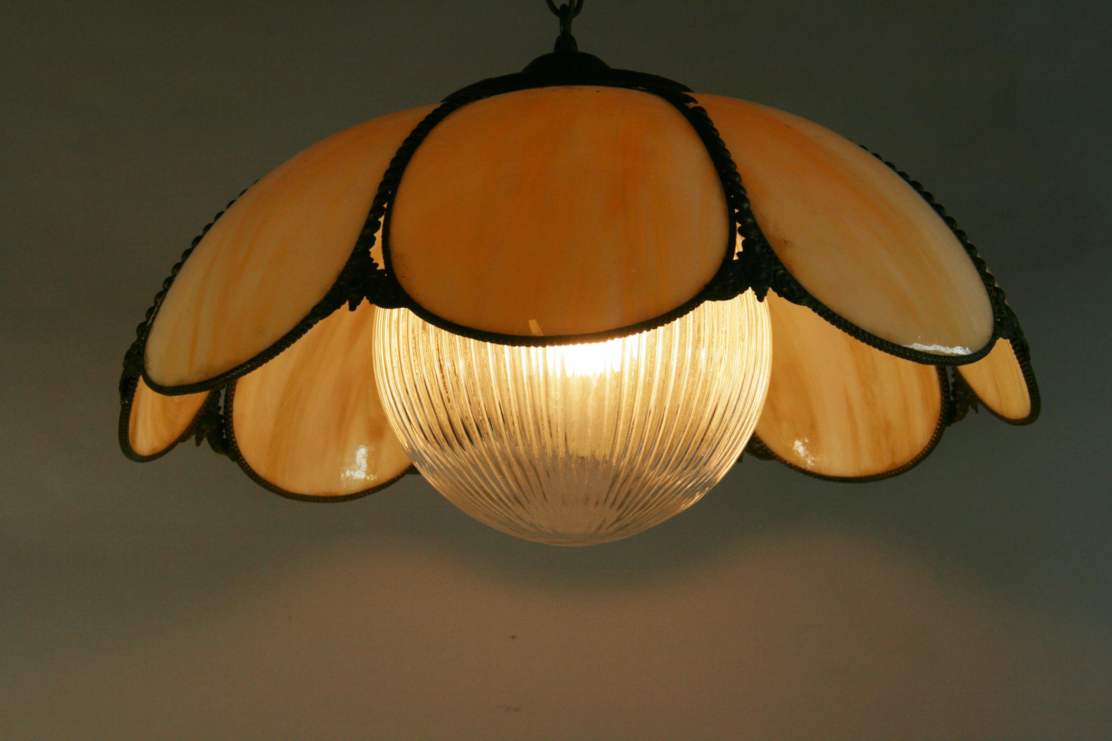 1719 Vintage bent glass and ribbed glass pendant
Rewired
