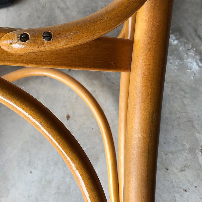 Solid bentwood construction from the 1930s. The form of the backrest is in the style of a Richard Riemerschmid chair. The seat is stretched with cane and very comfortable. Excellent original condition never renewed.