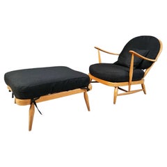 Vintage bentwood armchair and footstool by Ercol, 1960s